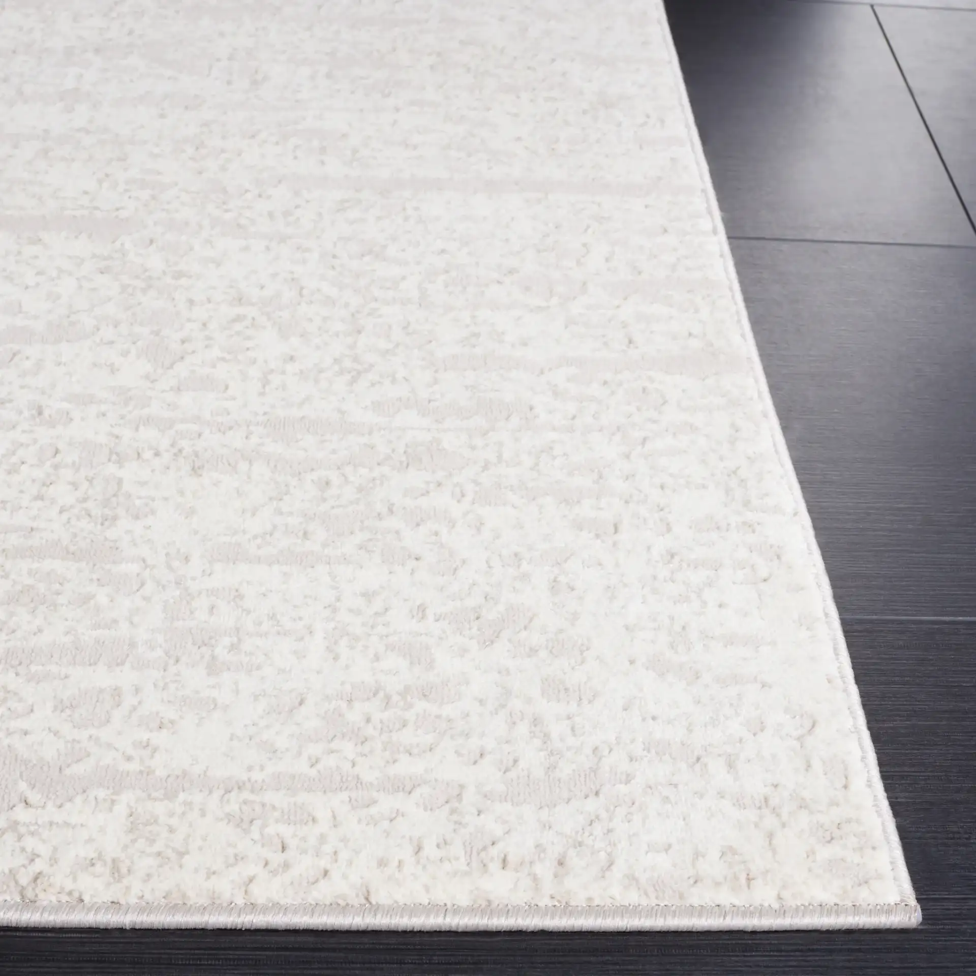 Continental Striated Abstract Rug in Ivory / Beige in a styled room