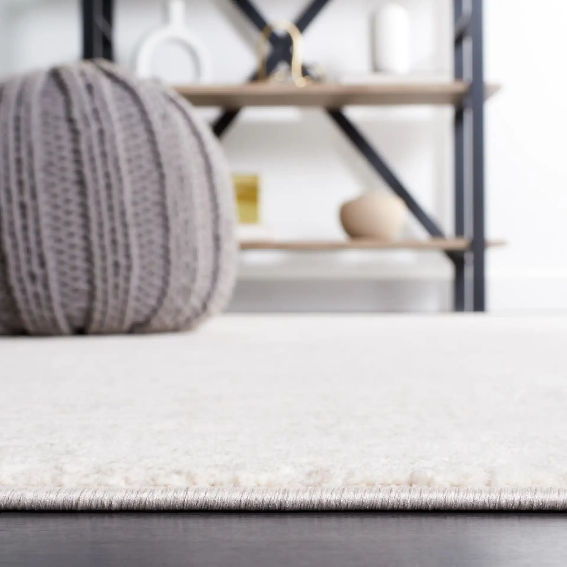 Continental Striated Abstract Rug in Ivory / Beige in a styled room