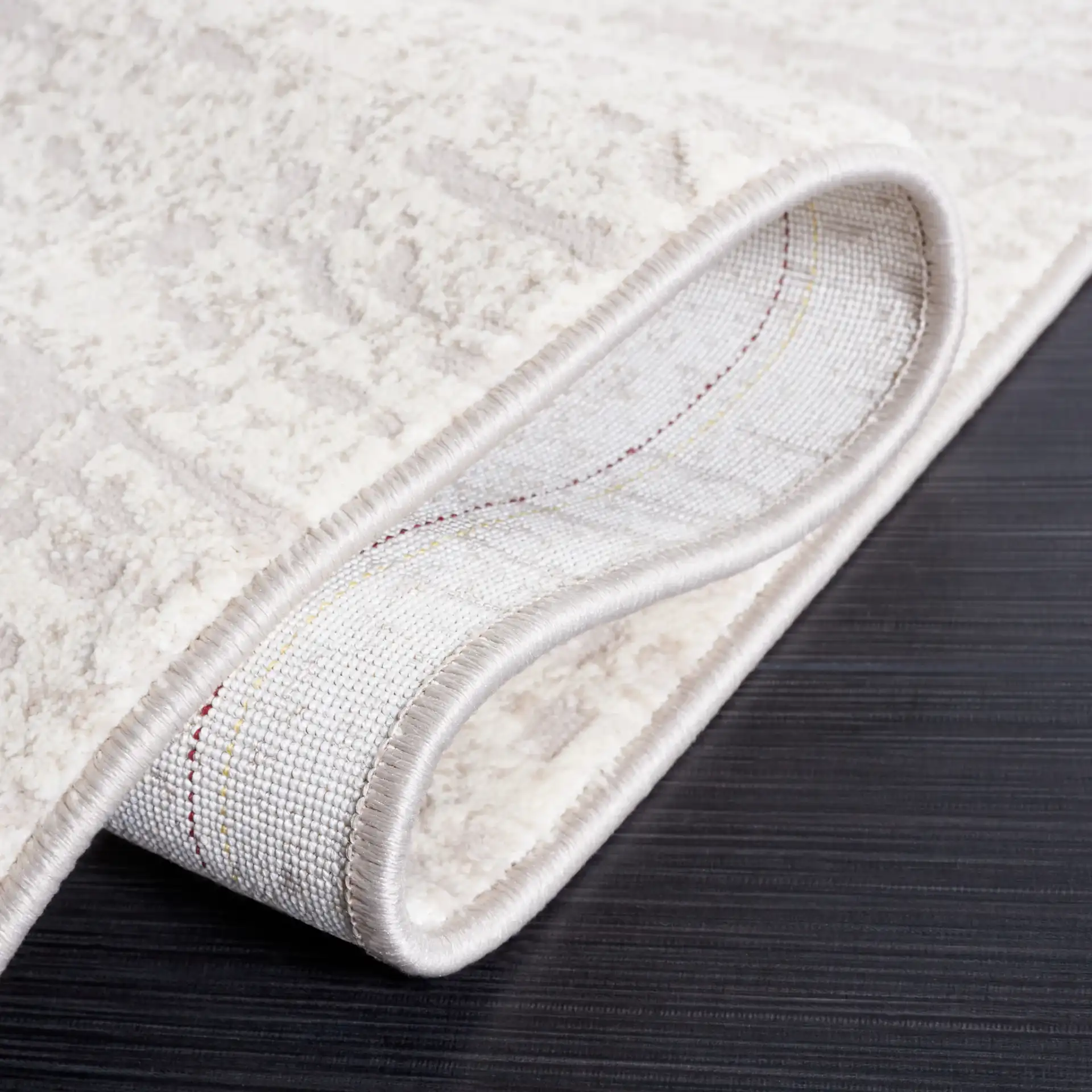 Continental Striated Abstract Rug in Ivory / Beige in a styled room