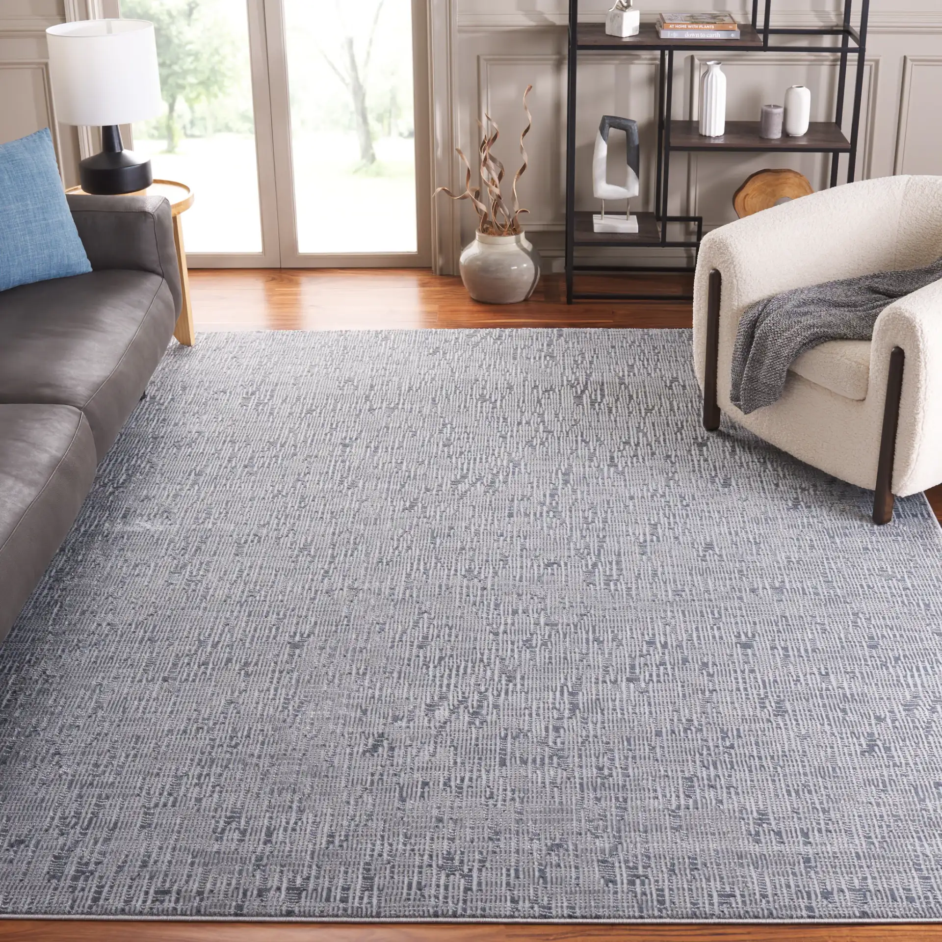 Continental Textured Linear Rug in Dark Gray / Light Gray in a styled room