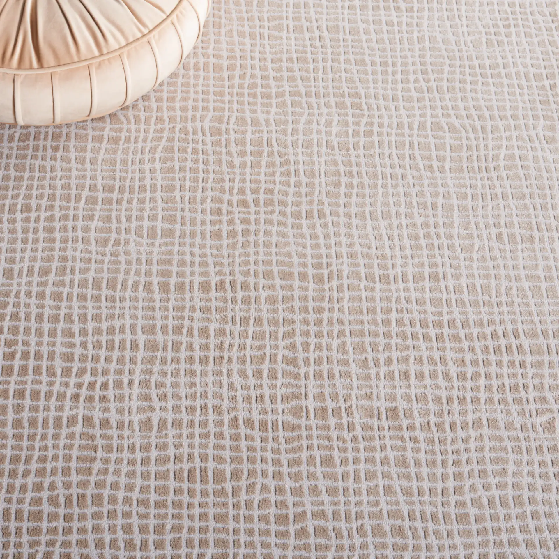 Continental Grid Rug in Beige / Gray in a styled room