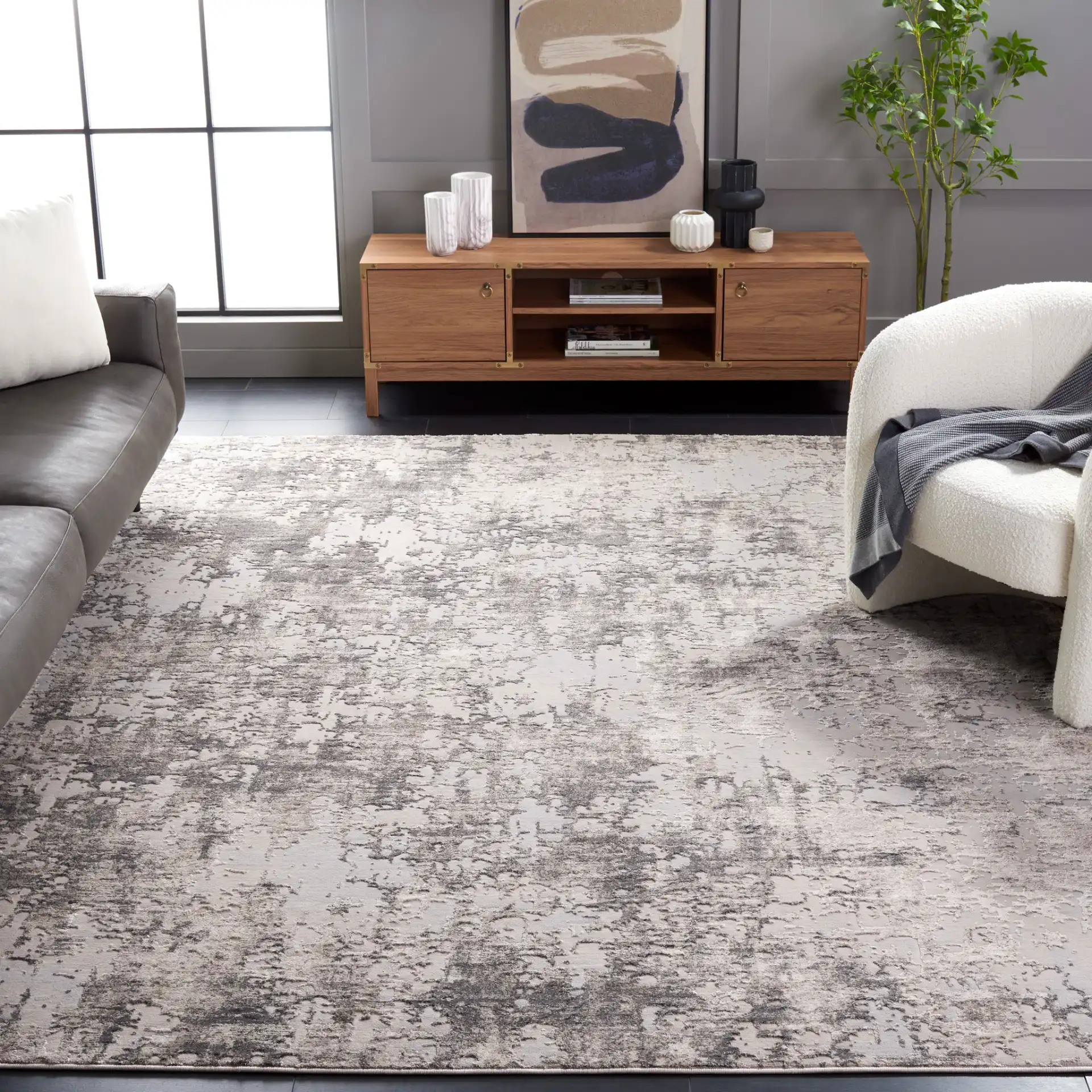 Continental Abstract Rug in Light Beige / Dark Gray in a styled room