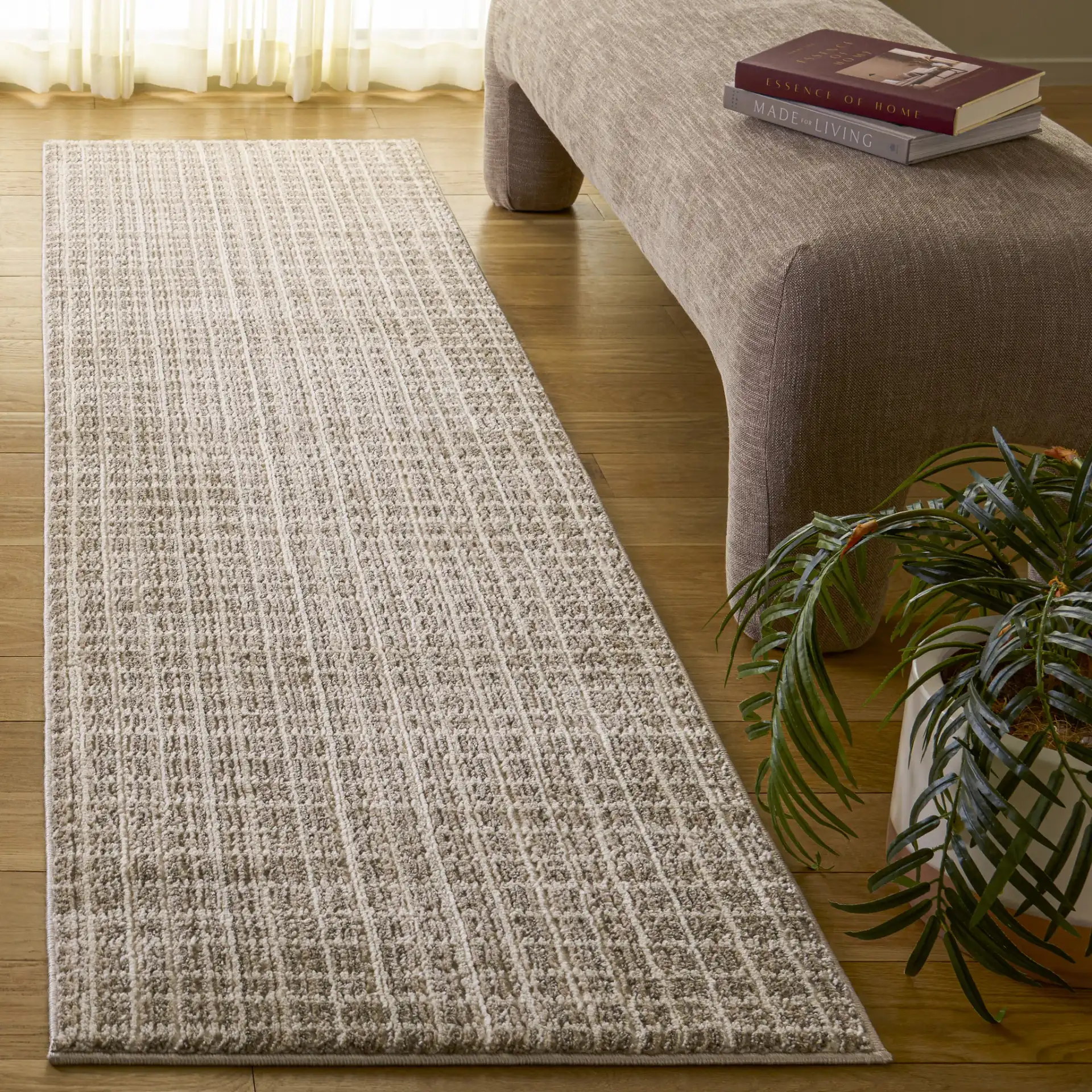 Cooper Modern Grid Rug in Beige / Ivory in a styled room