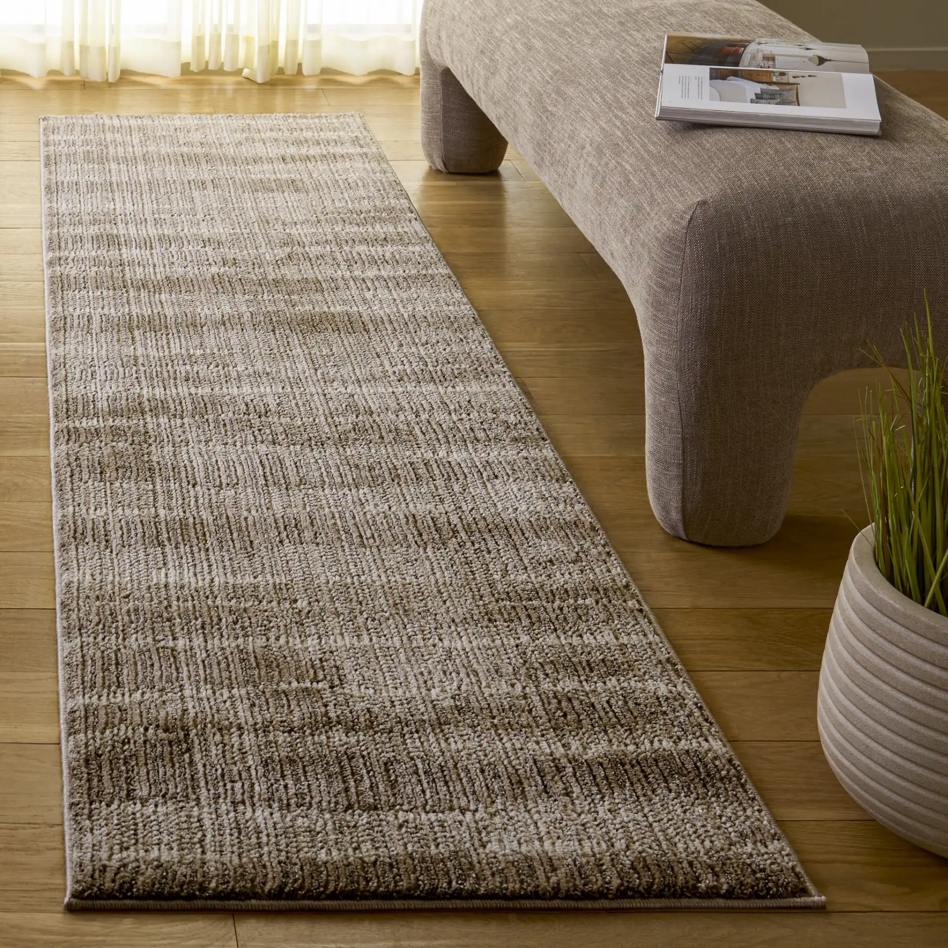 Cooper Modern Striated Rug in Beige / Ivory in a styled room