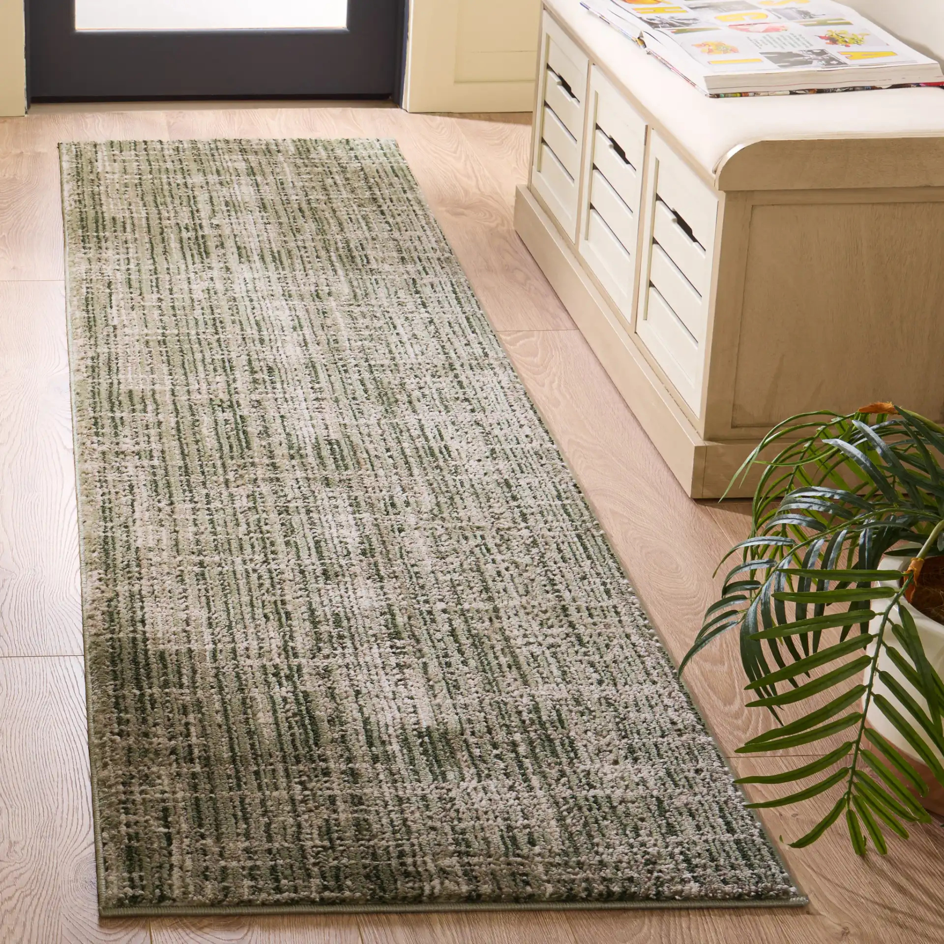 Cooper Modern Crosshatch Rug in Green / Ivory in a styled room