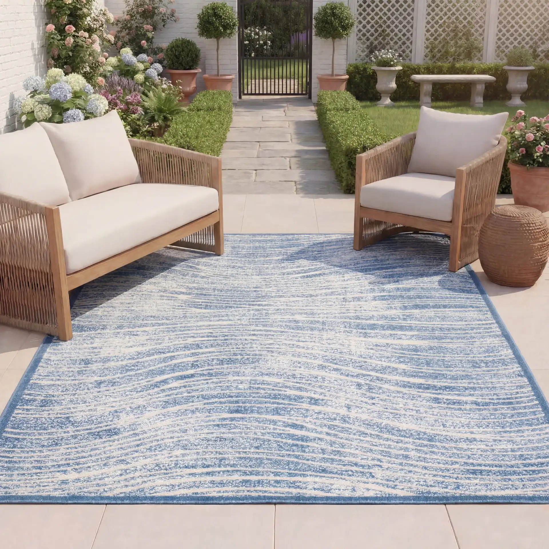 Cottage Ripple Outdoor Rug in Blue in a styled room
