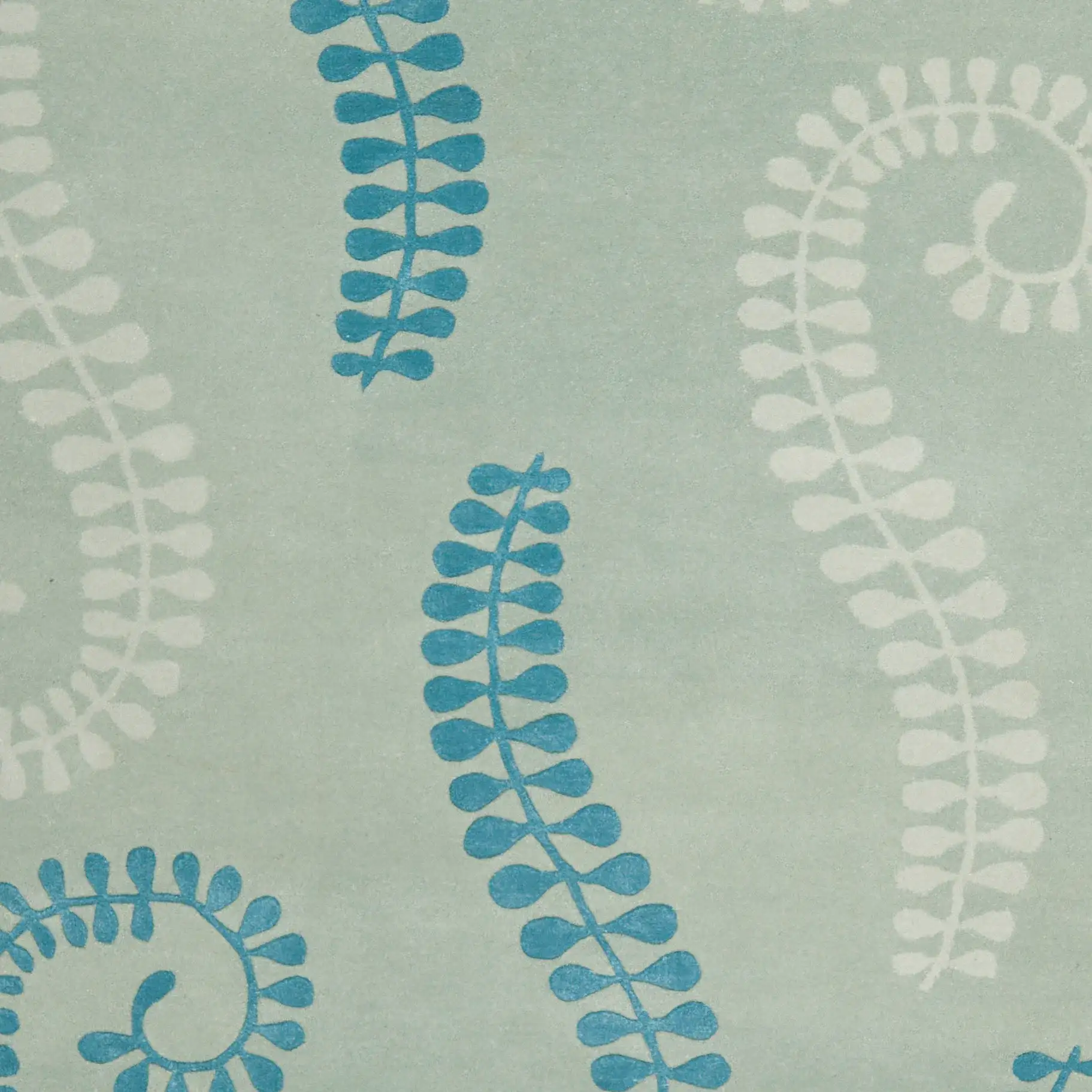 Capri Fern Hand-Tufted Wool Rug in Silver / Light Blue in a styled room