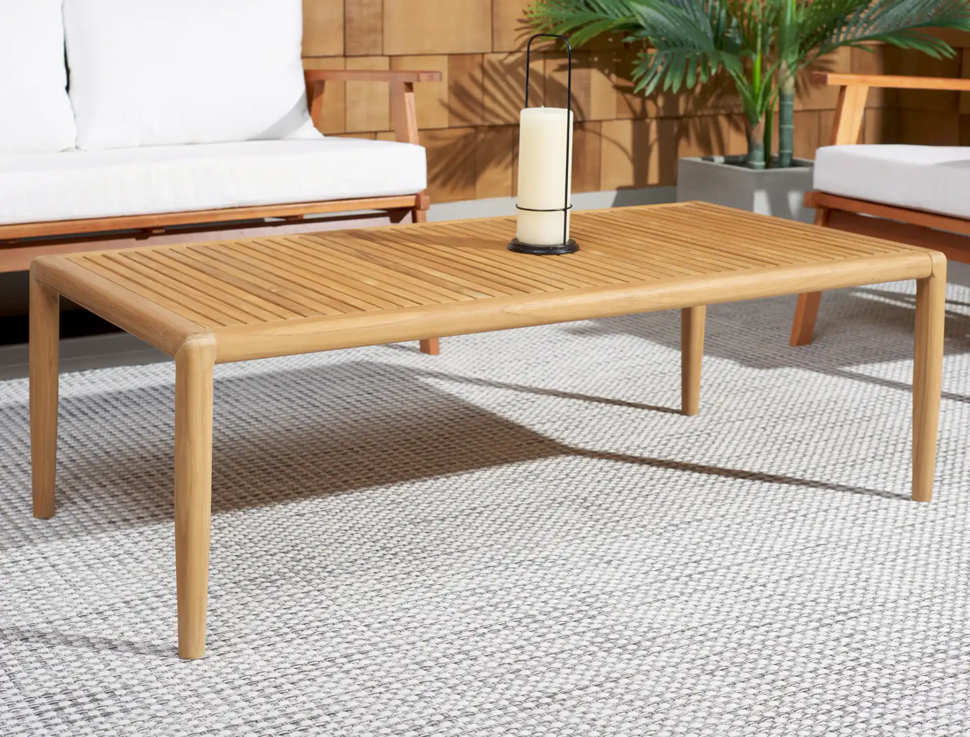 Tortuga Patio Coffee Table in Natural in a styled room