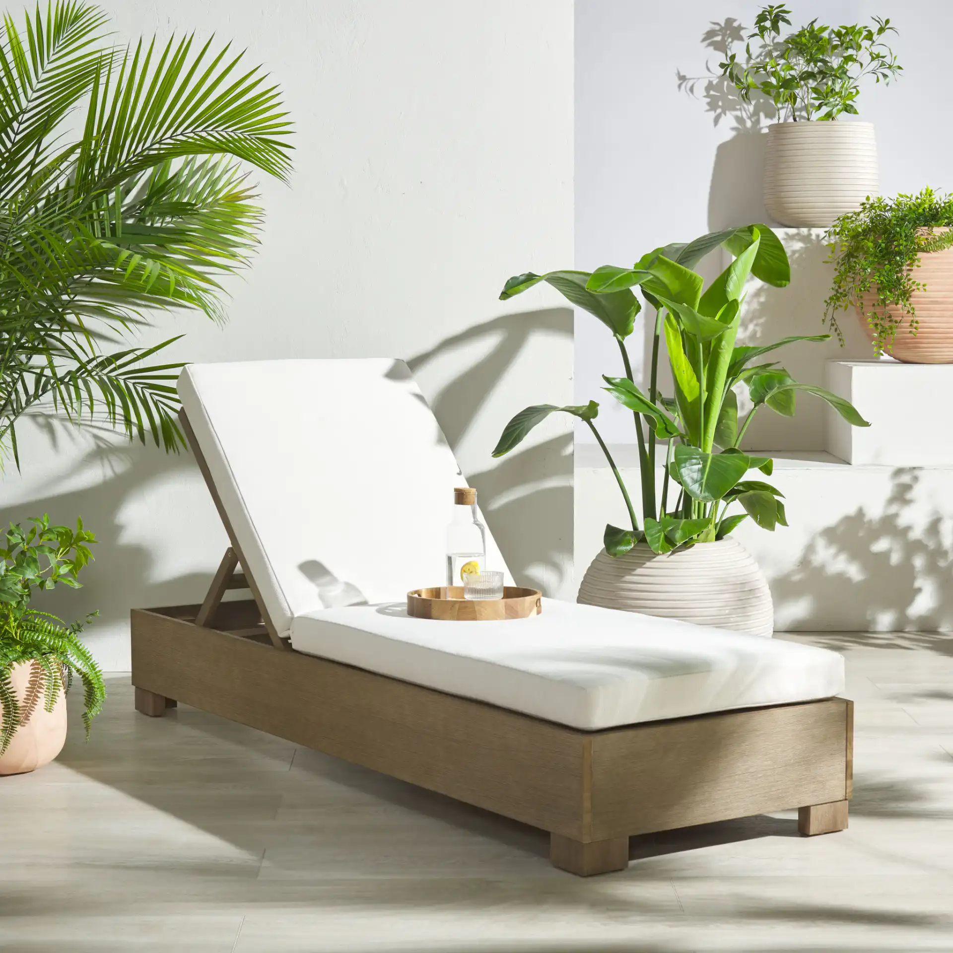 Blanquilla Chaise Lounge in Natural / Beige in a styled room