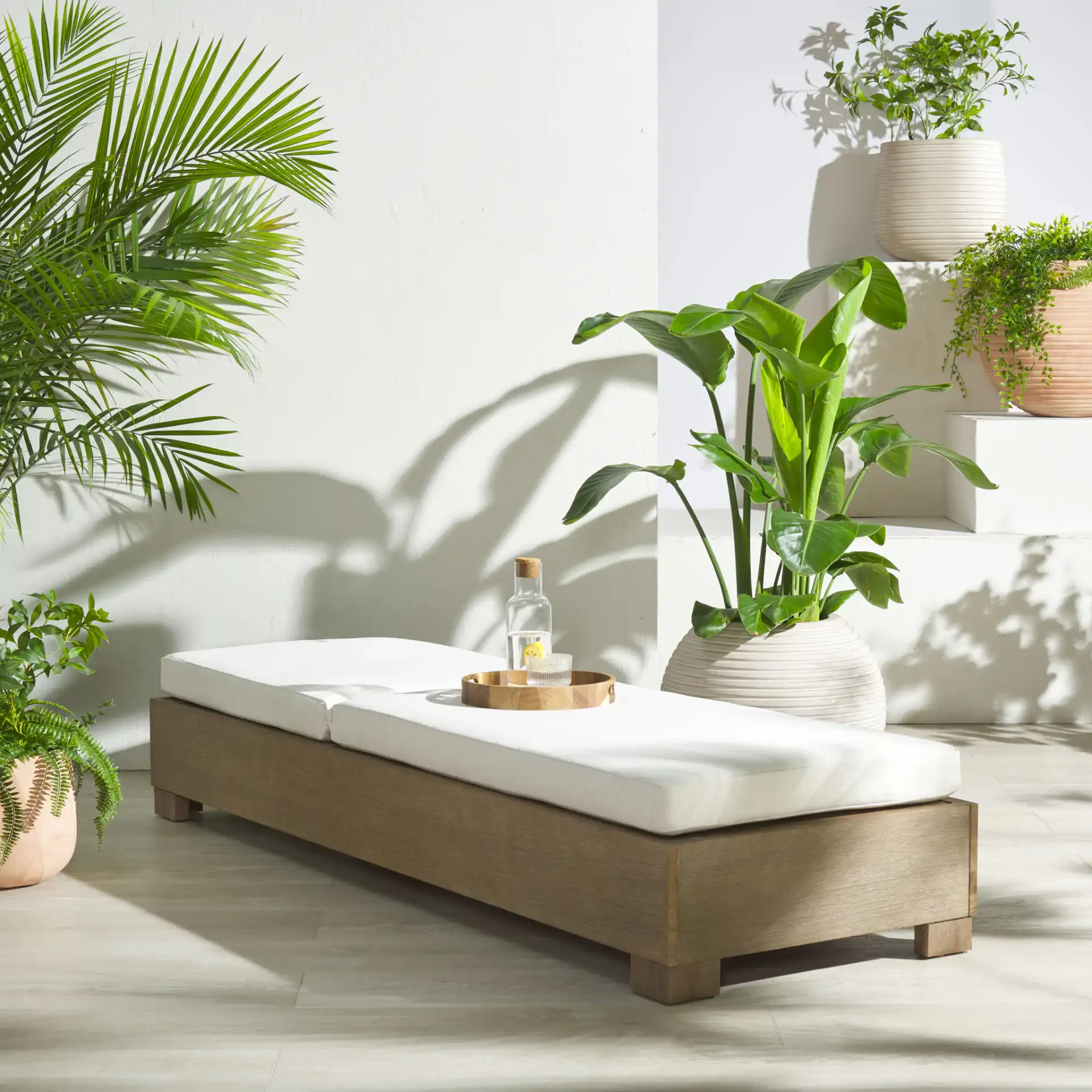Blanquilla Chaise Lounge in Natural / Beige in a styled room
