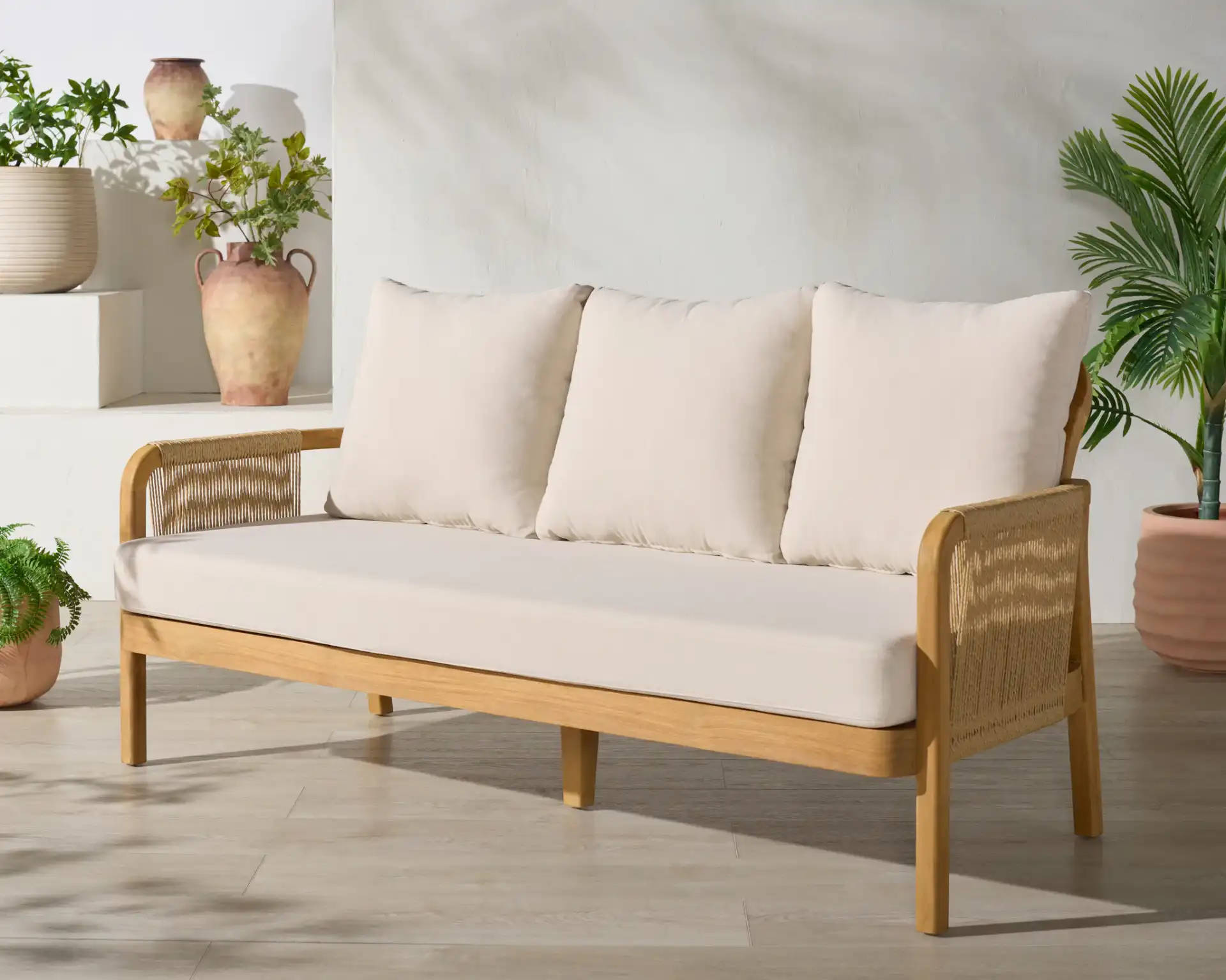Rogers Teak & Hyacinth Sofa in Natural / Beige in a styled room