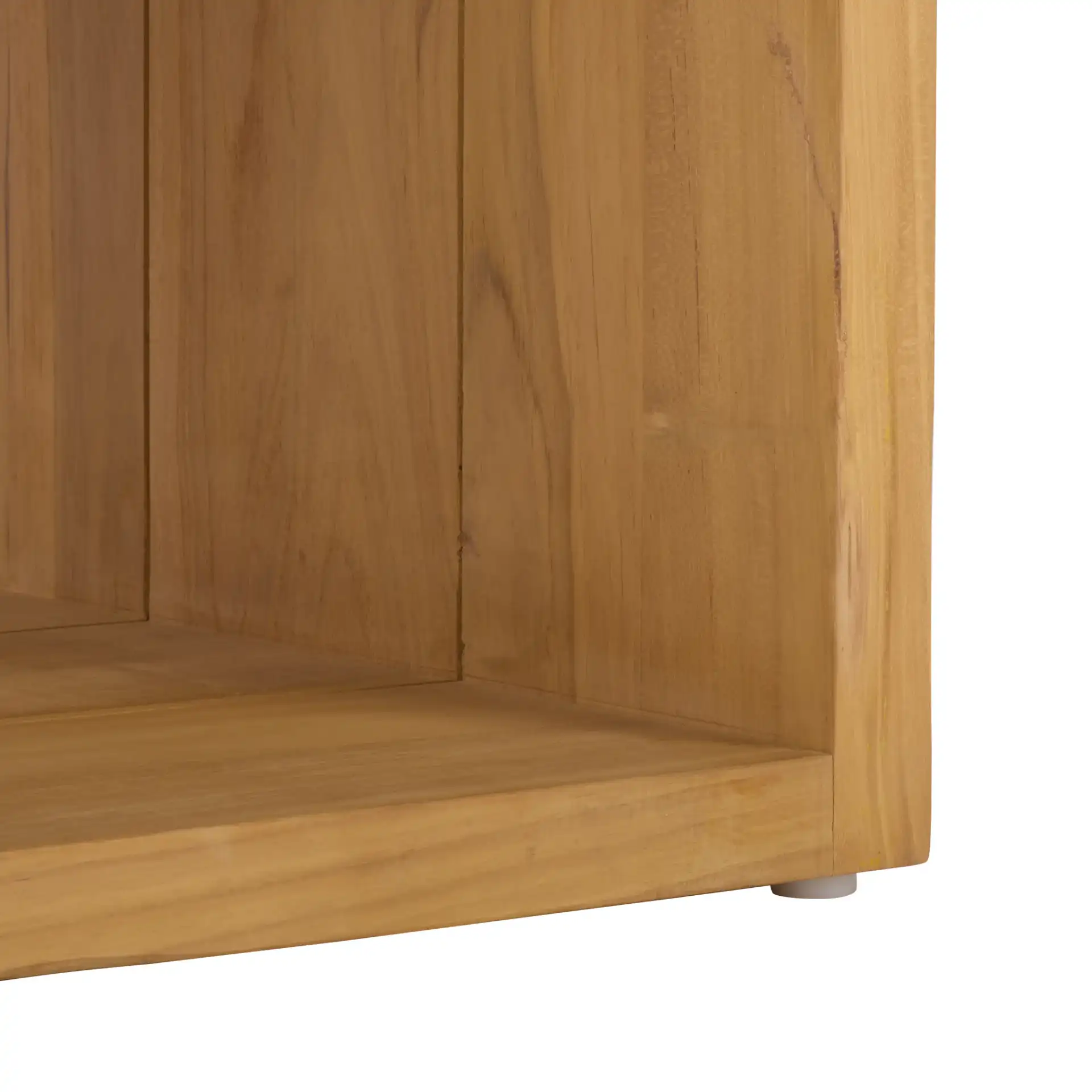 Cove Teak Outdoor Coffee Table in Natural in a styled room