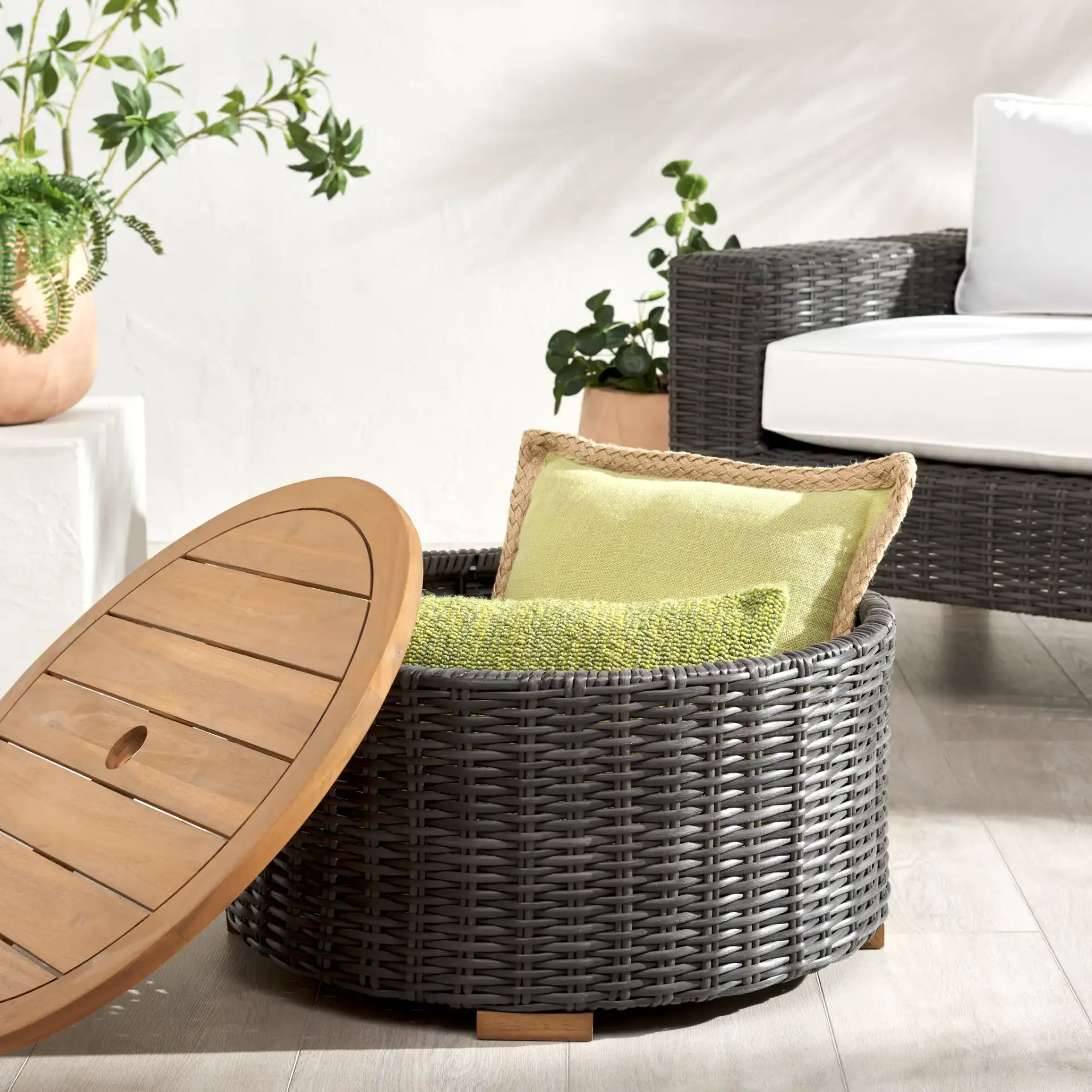 Anguilla Wicker Coffee Table in Dark Gray in a styled room