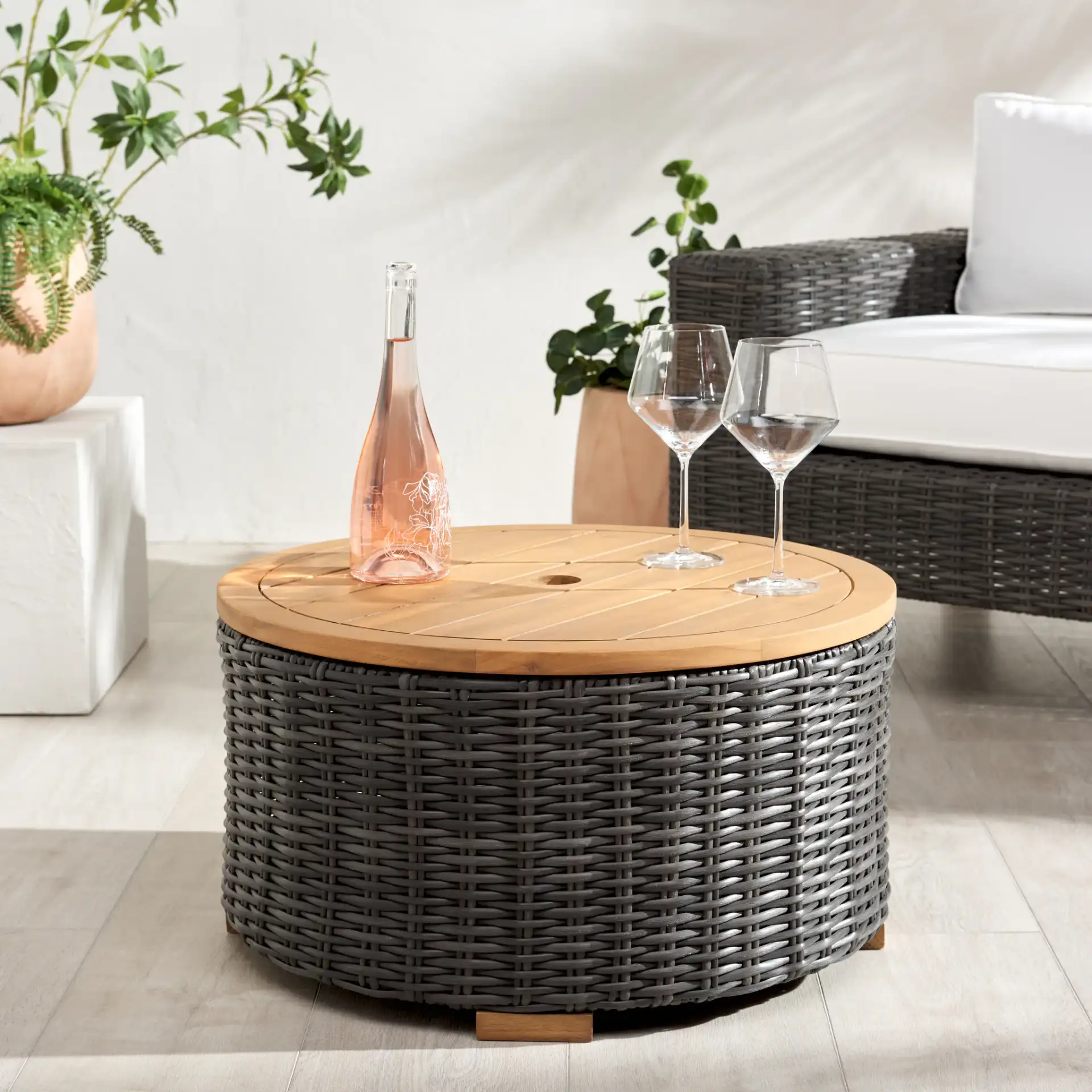 Anguilla Wicker Coffee Table in Dark Gray in a styled room