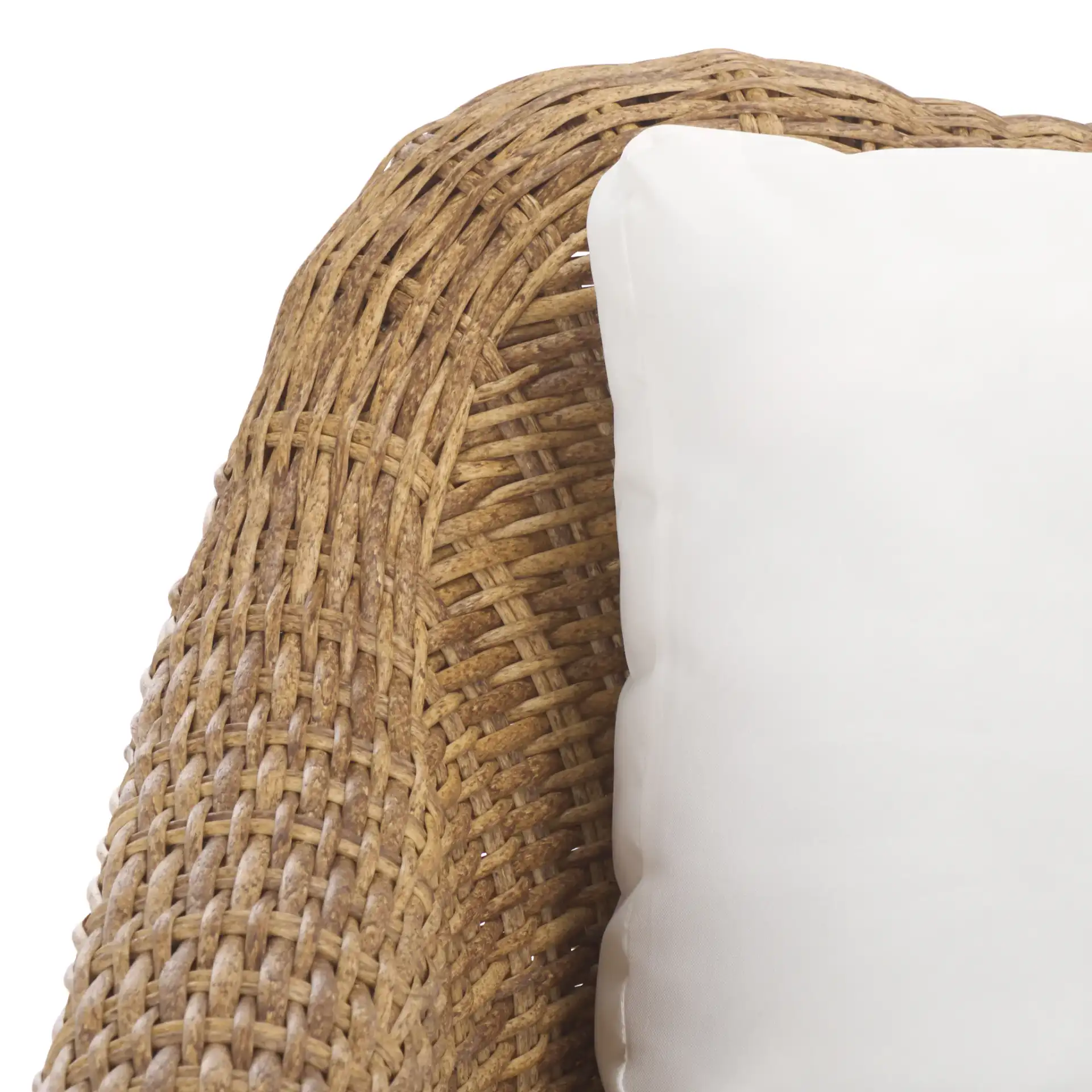 Melbourne Wicker Patio Chair in Natural / White in a styled room