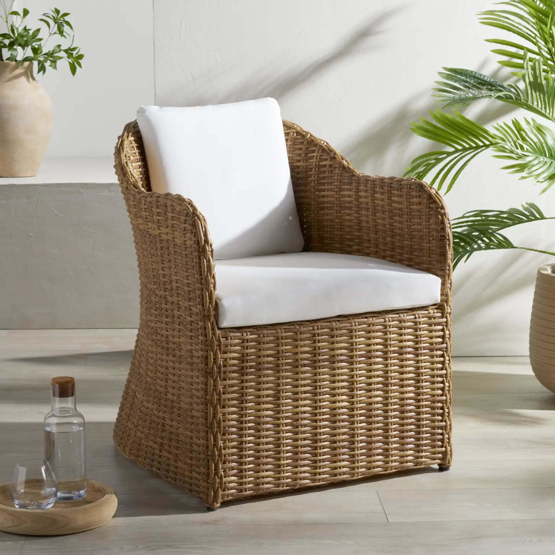 Melbourne Wicker Dining Chair in Natural / White in a styled room