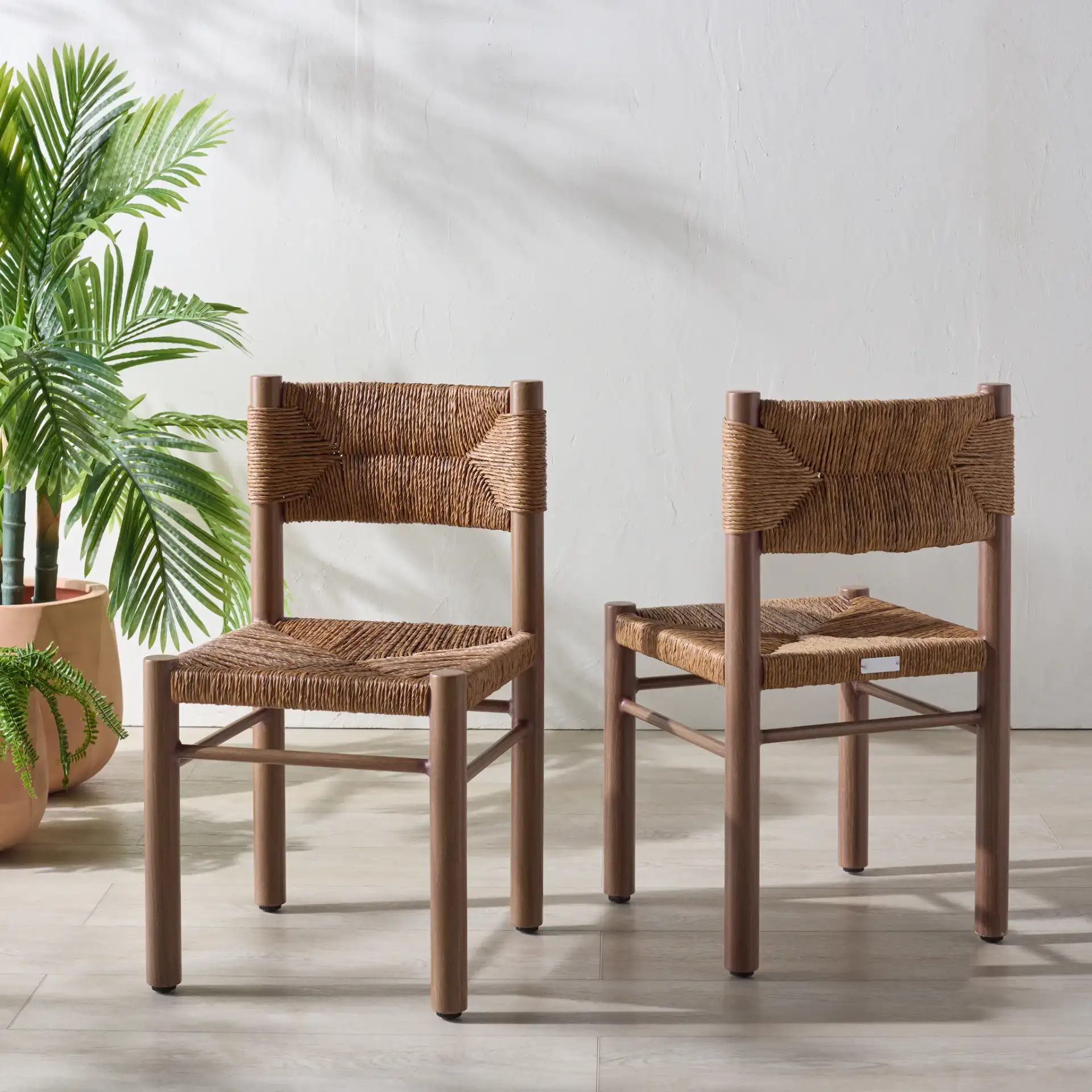 Romona Outdoor Dining Chair (Set of 2) in Brown in a styled room