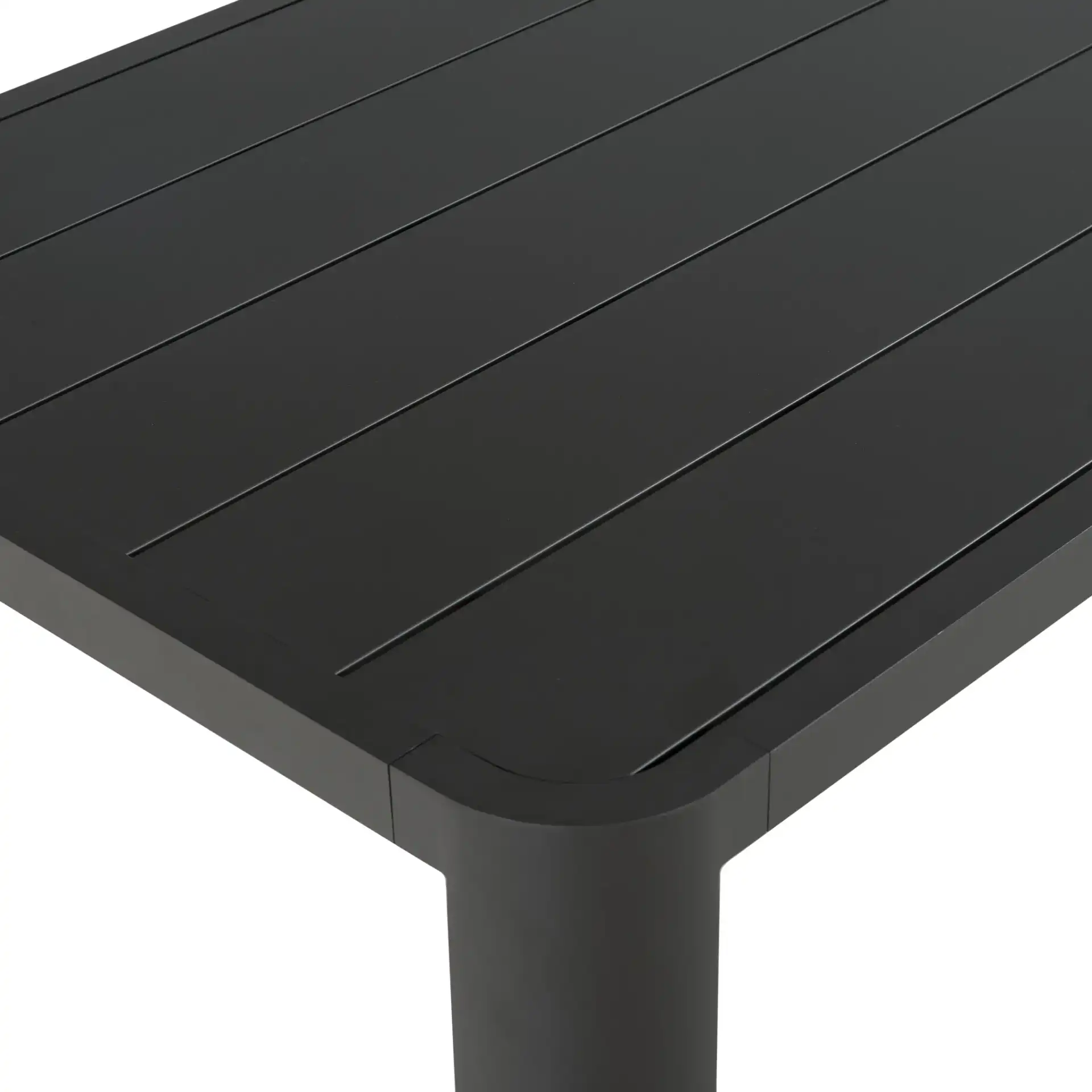Leilani Aluminum Dining Table in Dark Gray in a styled room