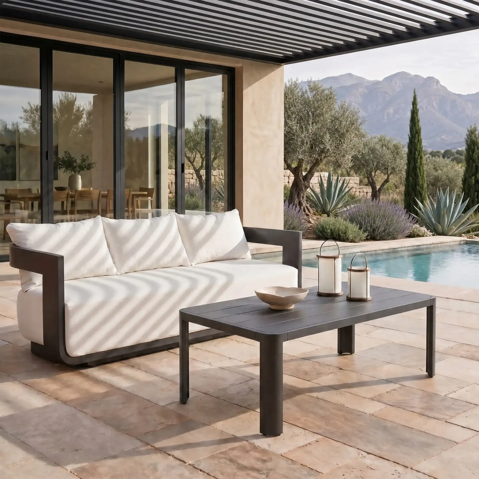 Leilani Aluminum Dining Table in Dark Gray in a styled room