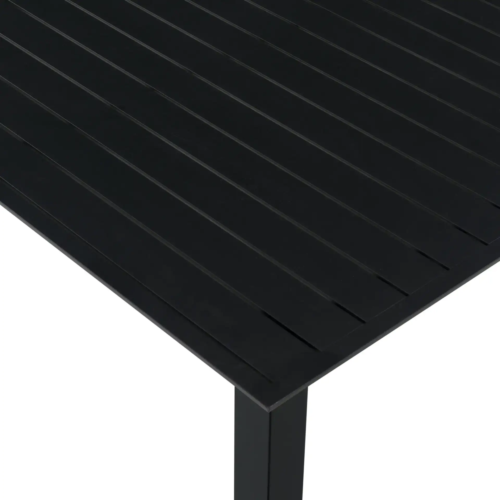 Capricio Aluminum 74" Outdoor Dining Table in Black in a styled room