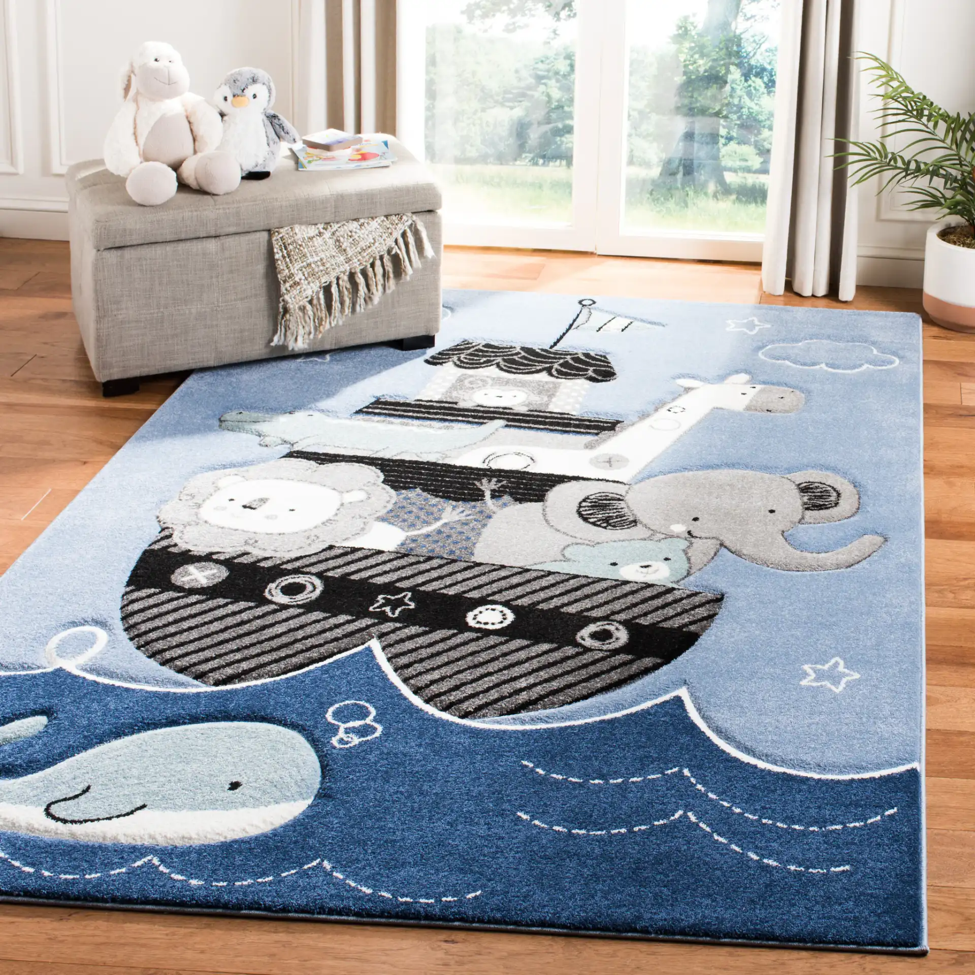 Carousel Kids Noah'S Ark Rug in Blue / Gray in a styled room