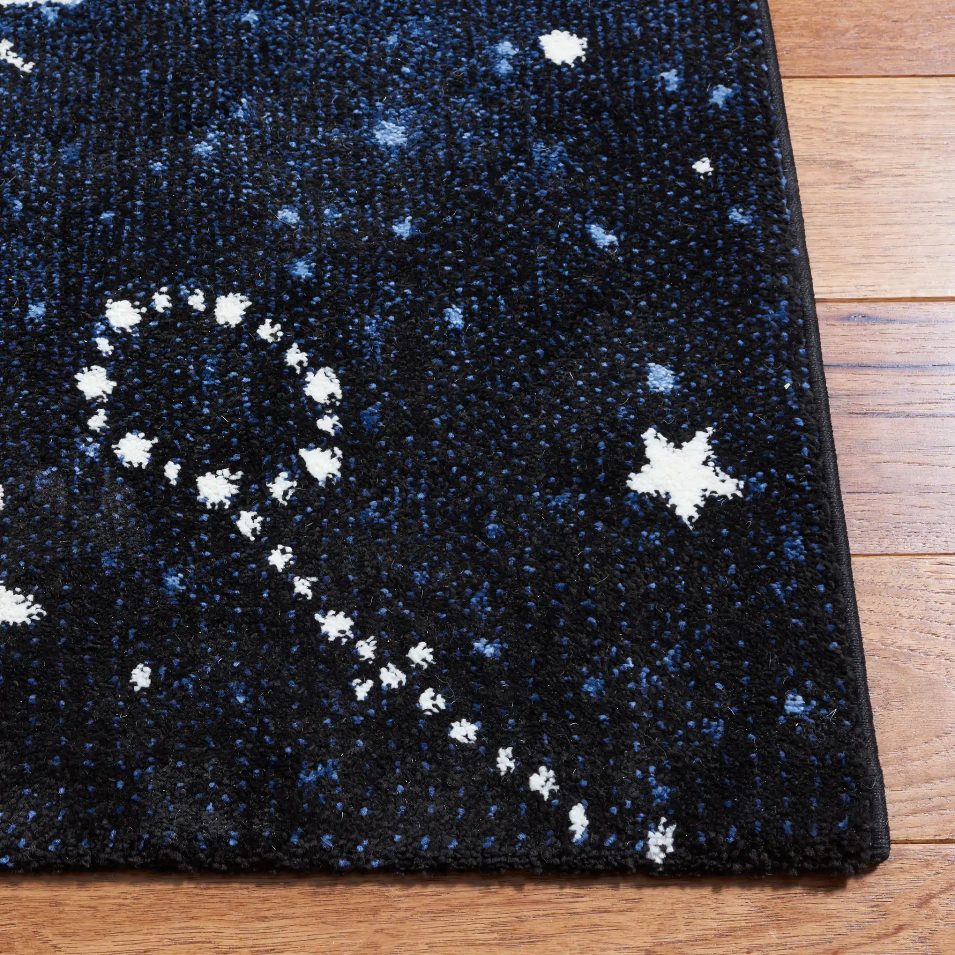 Carousel Kids Outer Space Rug in Dark Blue / Light Blue in a styled room