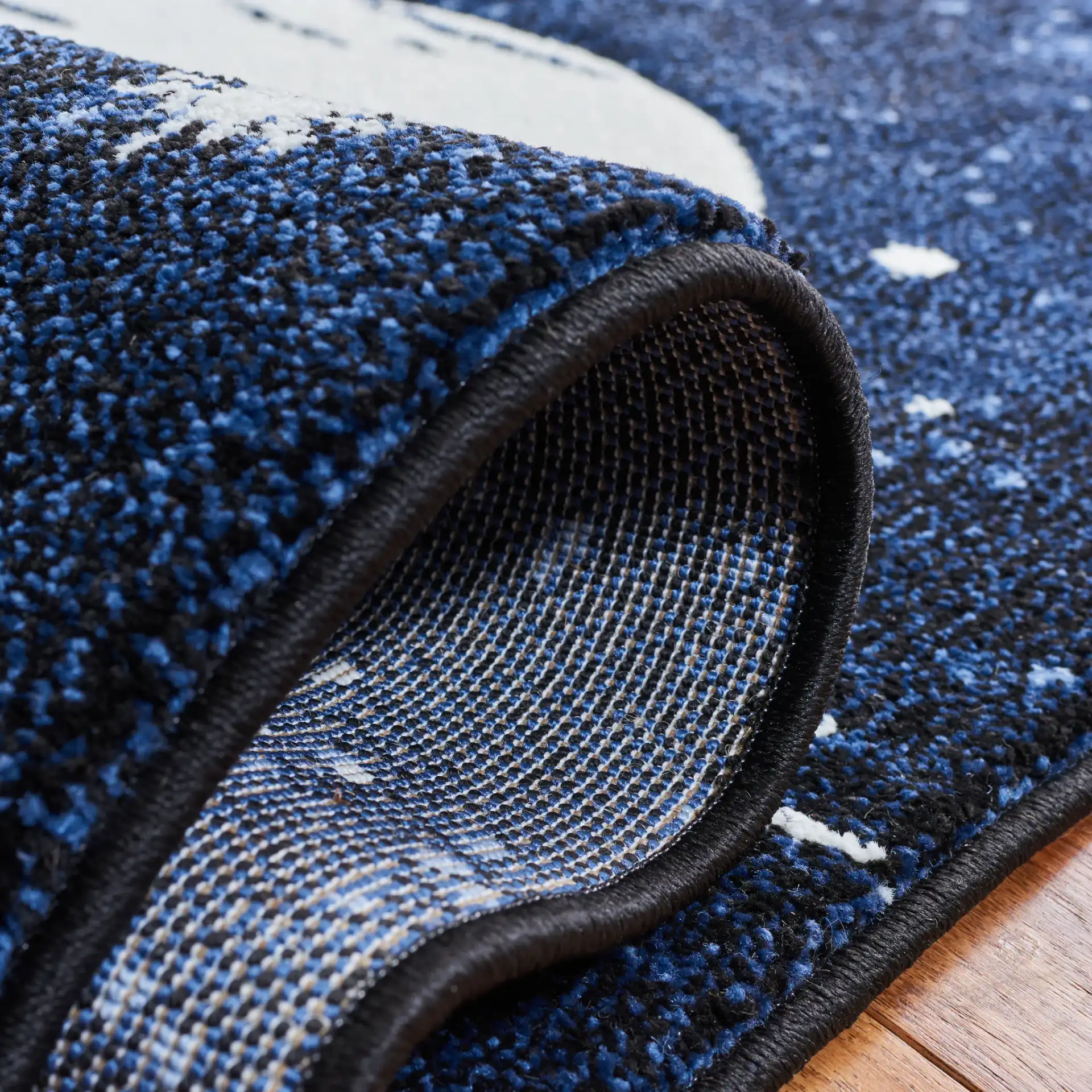 Carousel Kids Outer Space Rug in Dark Blue / Light Blue in a styled room