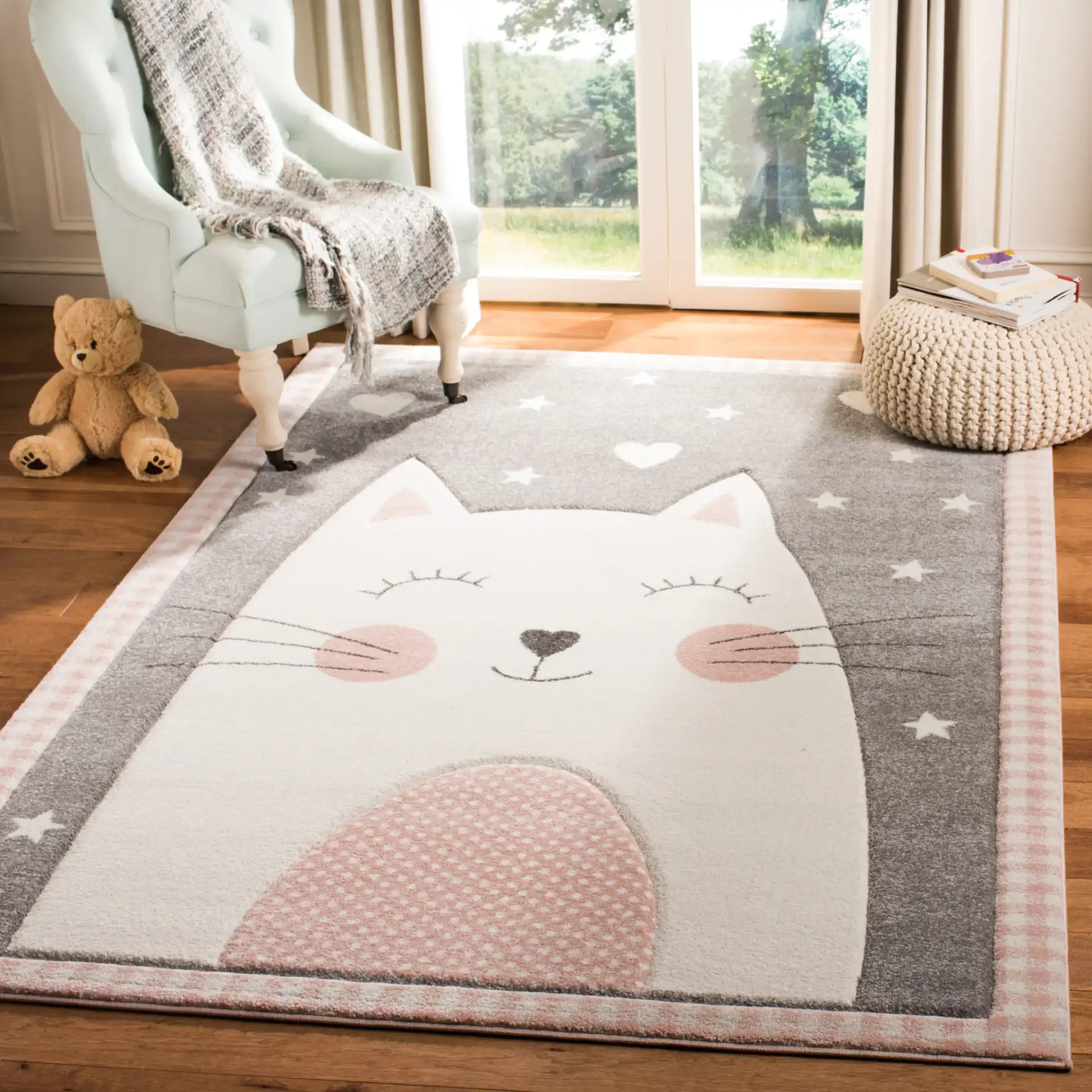 Carousel Kids Cat And Stars Rug in Pink / Gray in a styled room