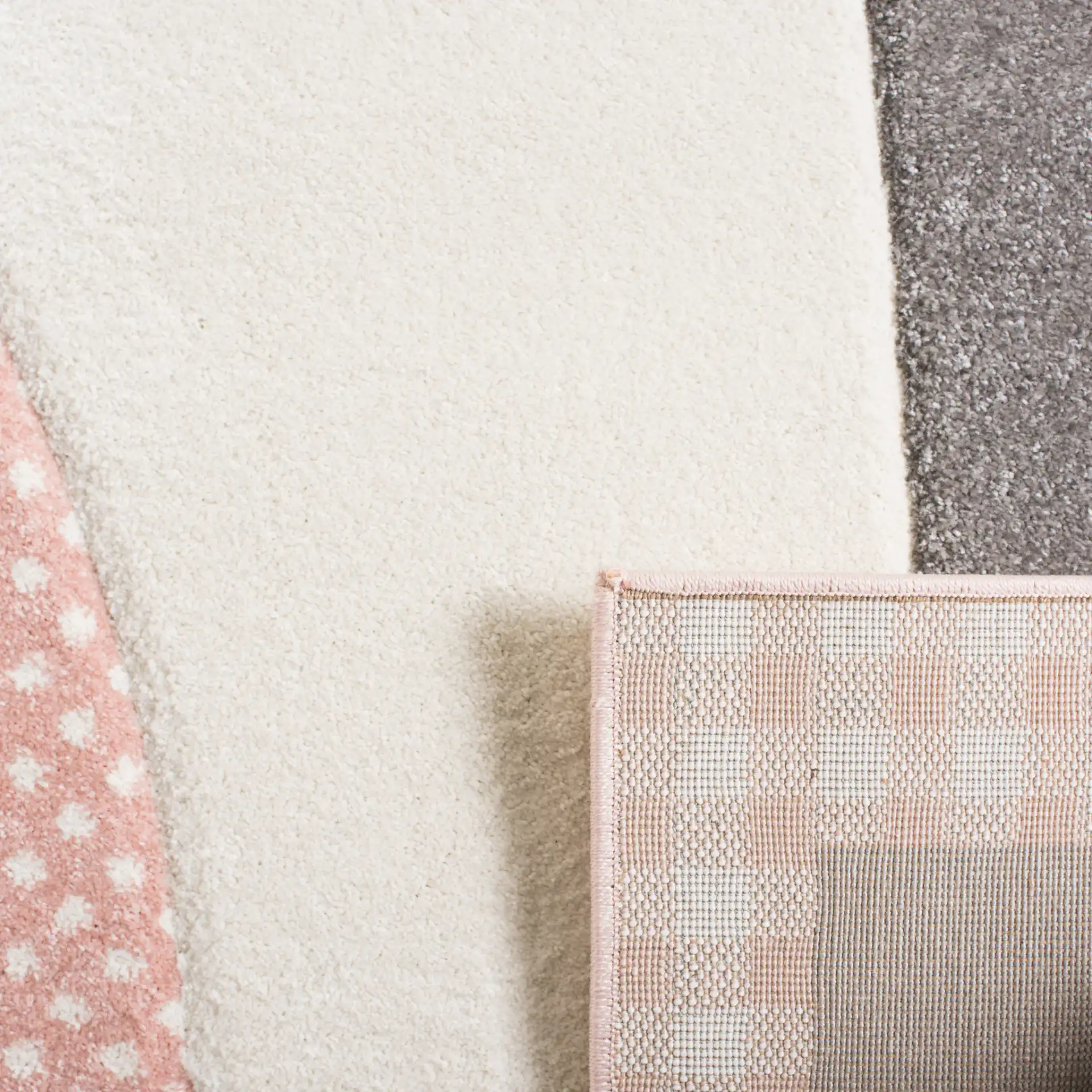 Carousel Kids Cat And Stars Rug in Pink / Gray in a styled room