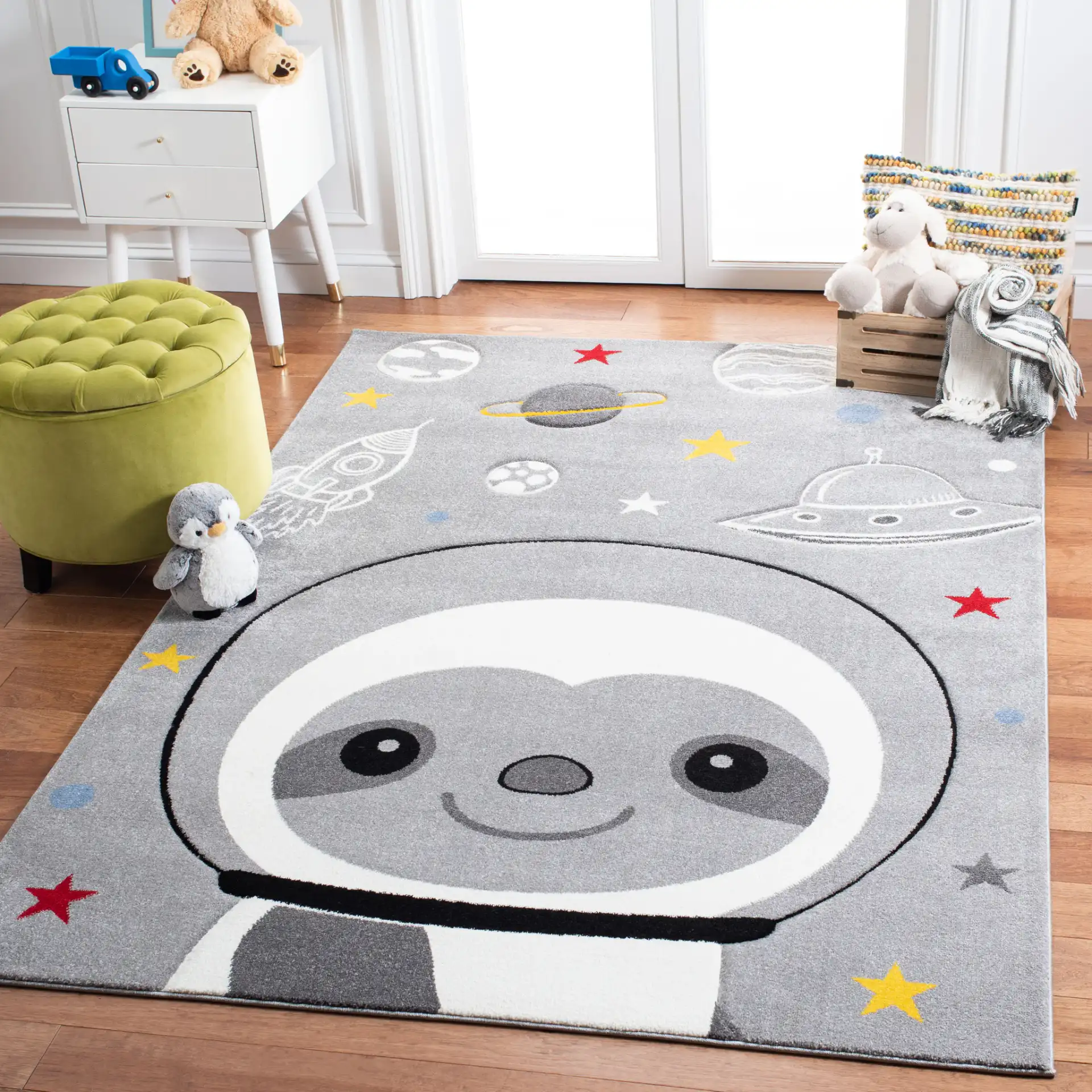 Carousel Kids Astronaut Sloth Rug in Gray / Ivory in a styled room