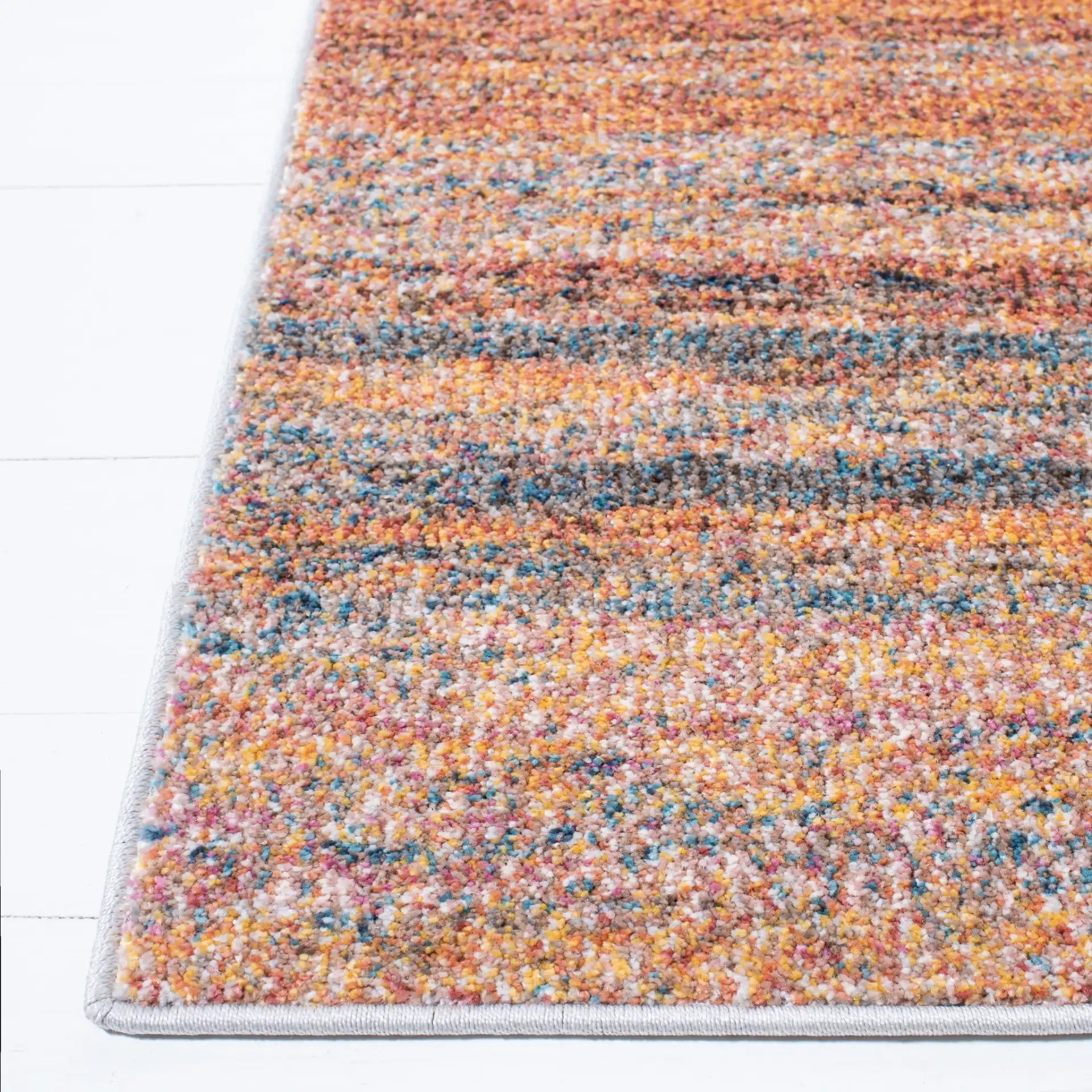 Crystal Abstract Stripe Rug in Rust / Blue in a styled room