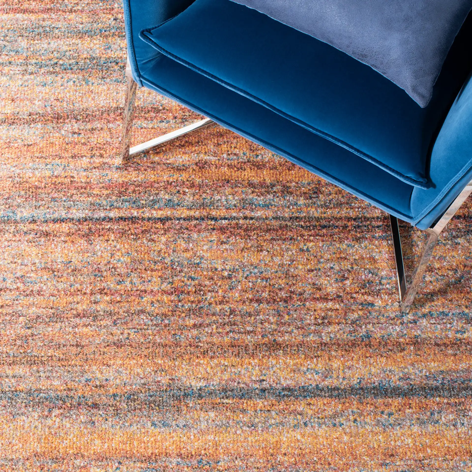 Crystal Abstract Stripe Rug in Rust / Blue in a styled room