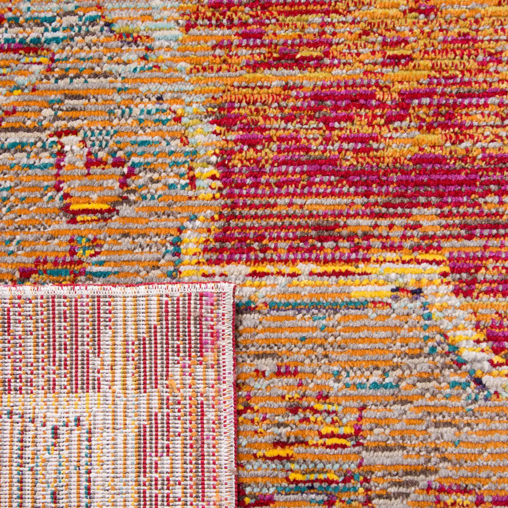 Crystal Medallion Bordered Rug in Orange / Light Blue in a styled room