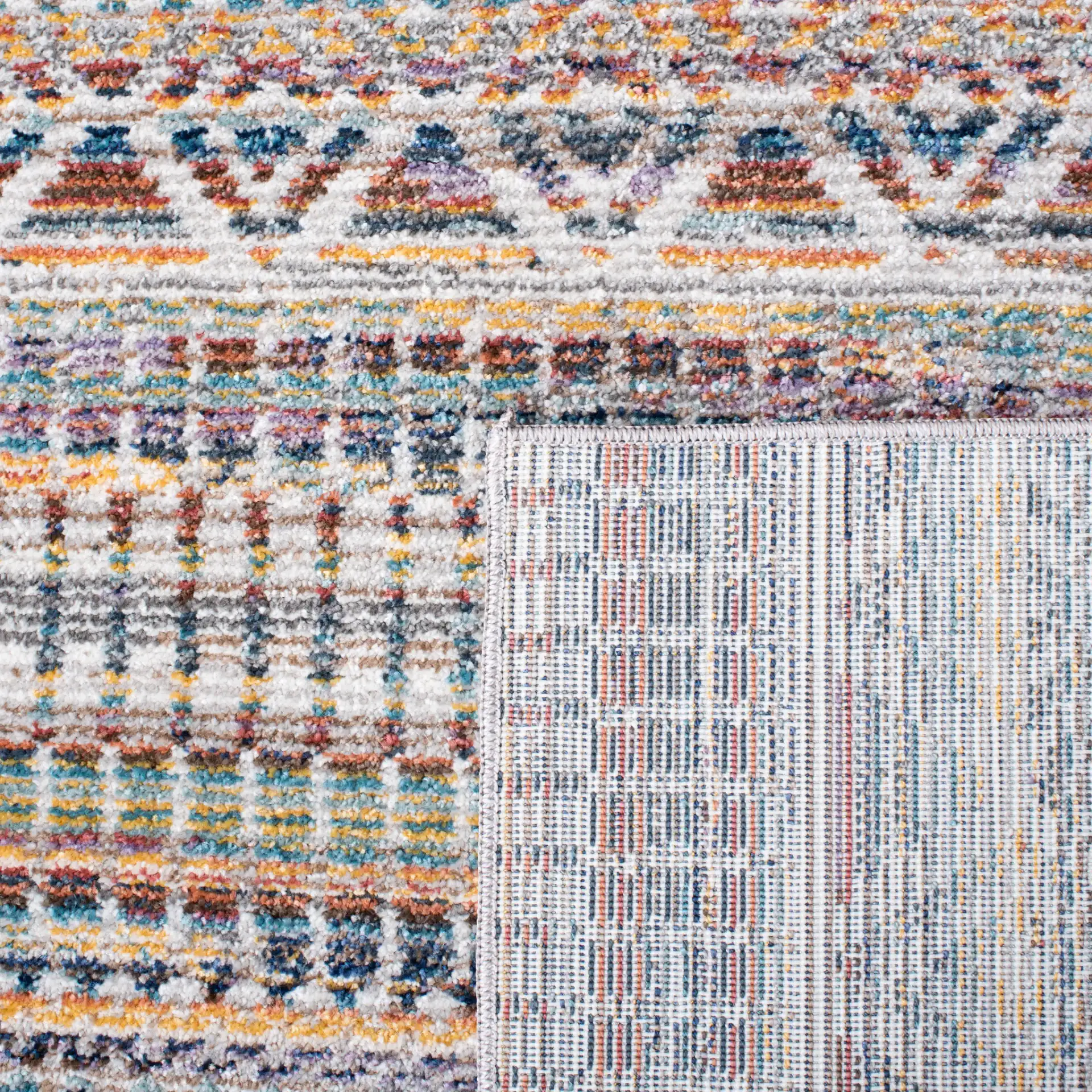 Crystal Banded Geometric Rug in Rust / Gold in a styled room