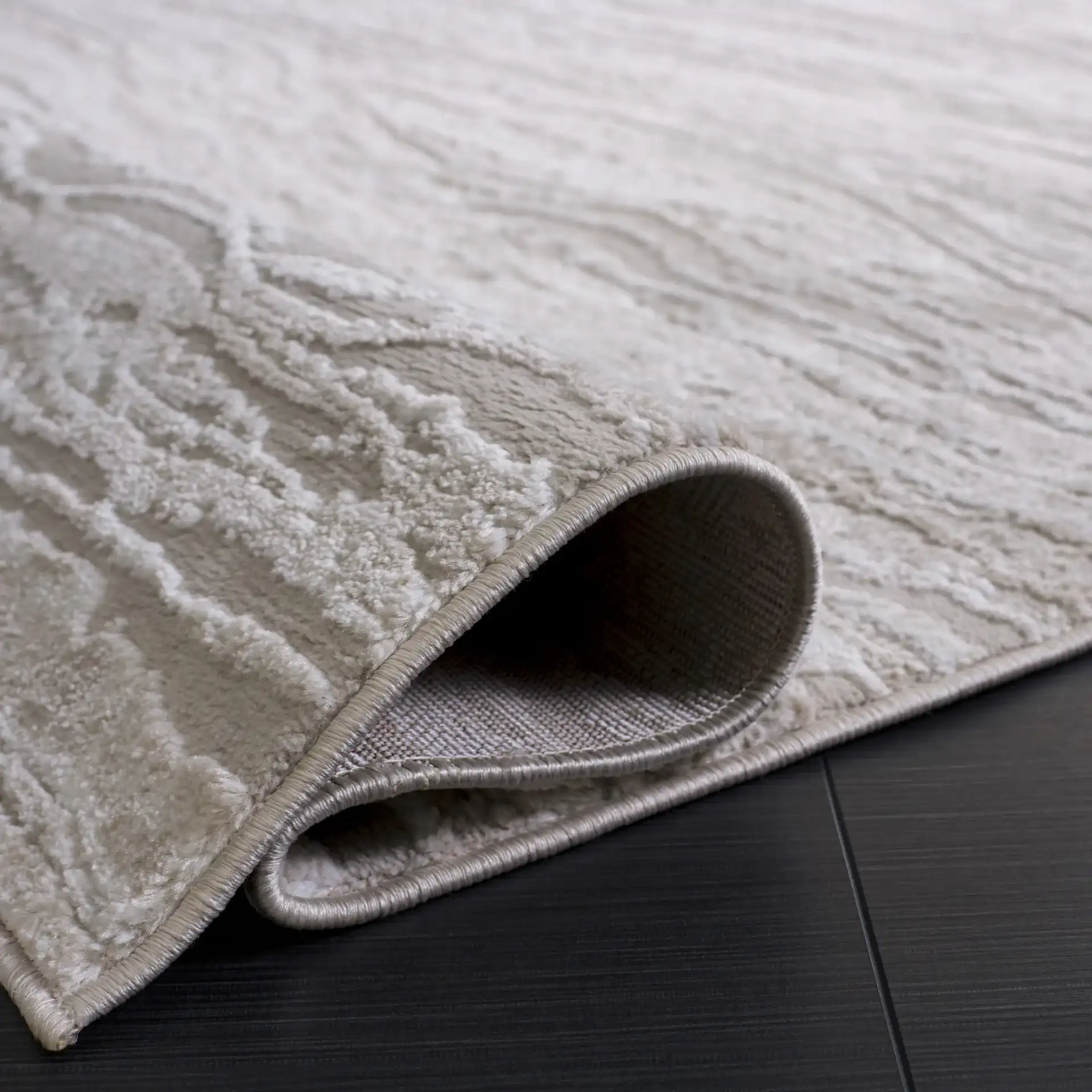 Carter Marble Rug in Ivory / Taupe in a styled room