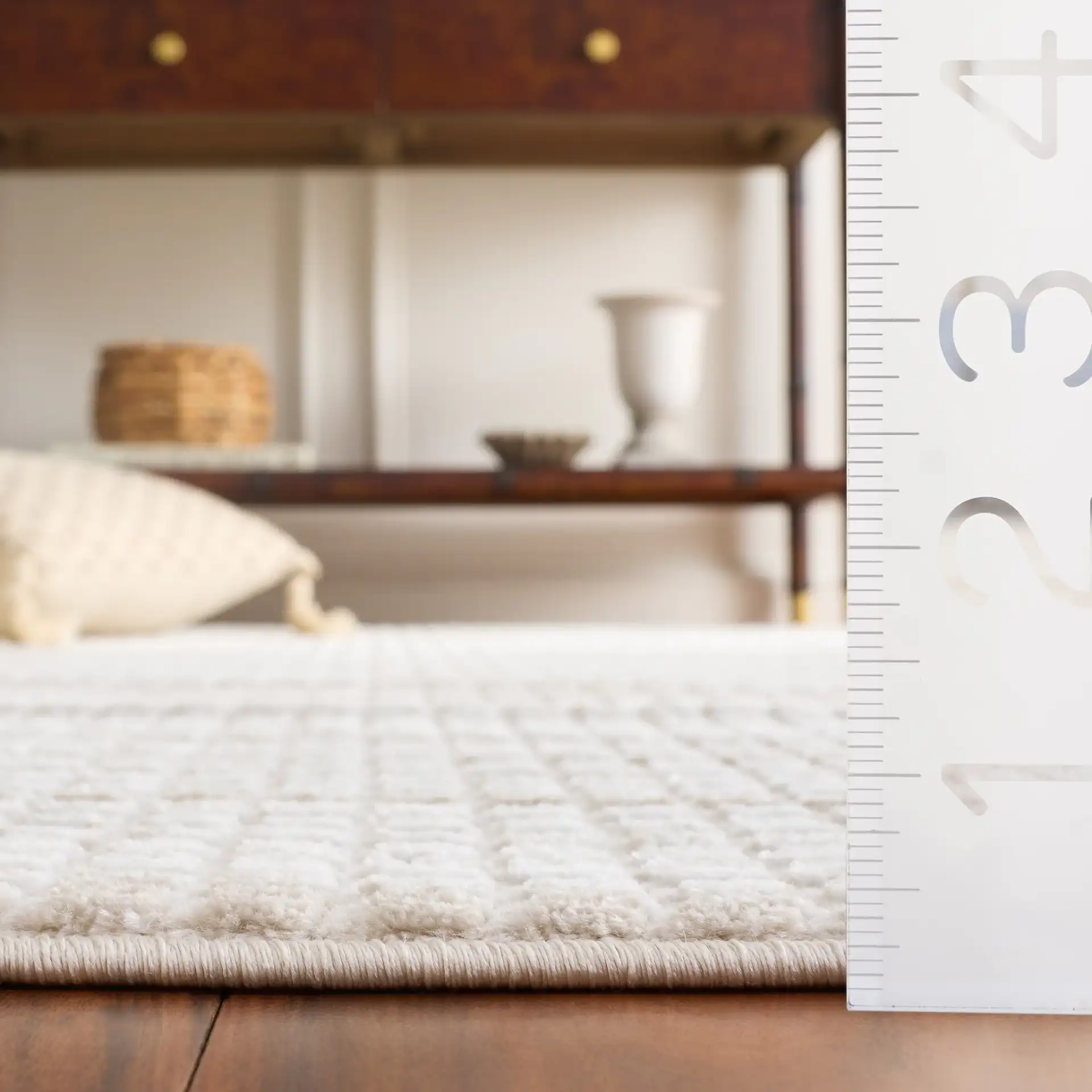 Carter Grid Rug in Ivory / Taupe in a styled room