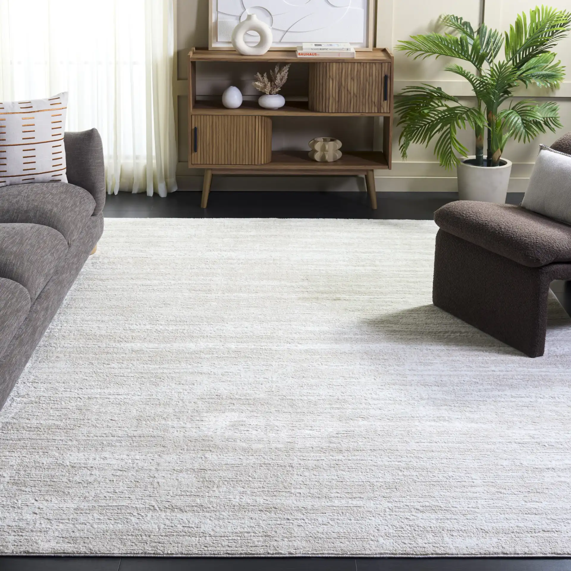 Carter Grid Rug in Ivory / Taupe in a styled room