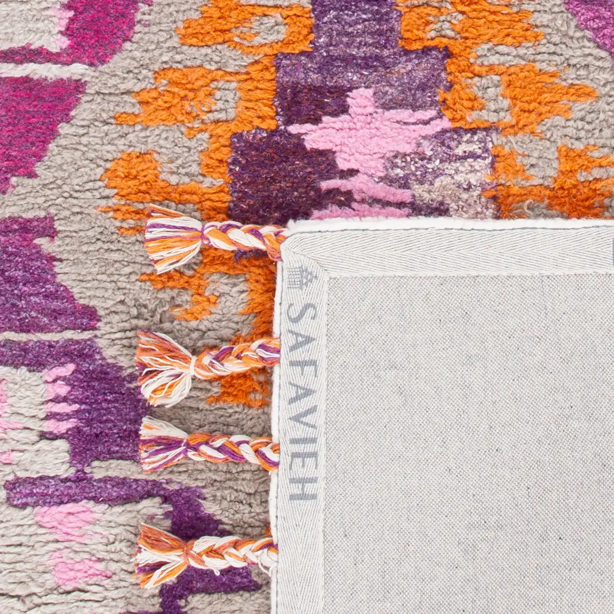Casablanca Diamond Medallion Hand-Tufted Wool Blend Shag Rug in Ivory / Multicolor in a styled room