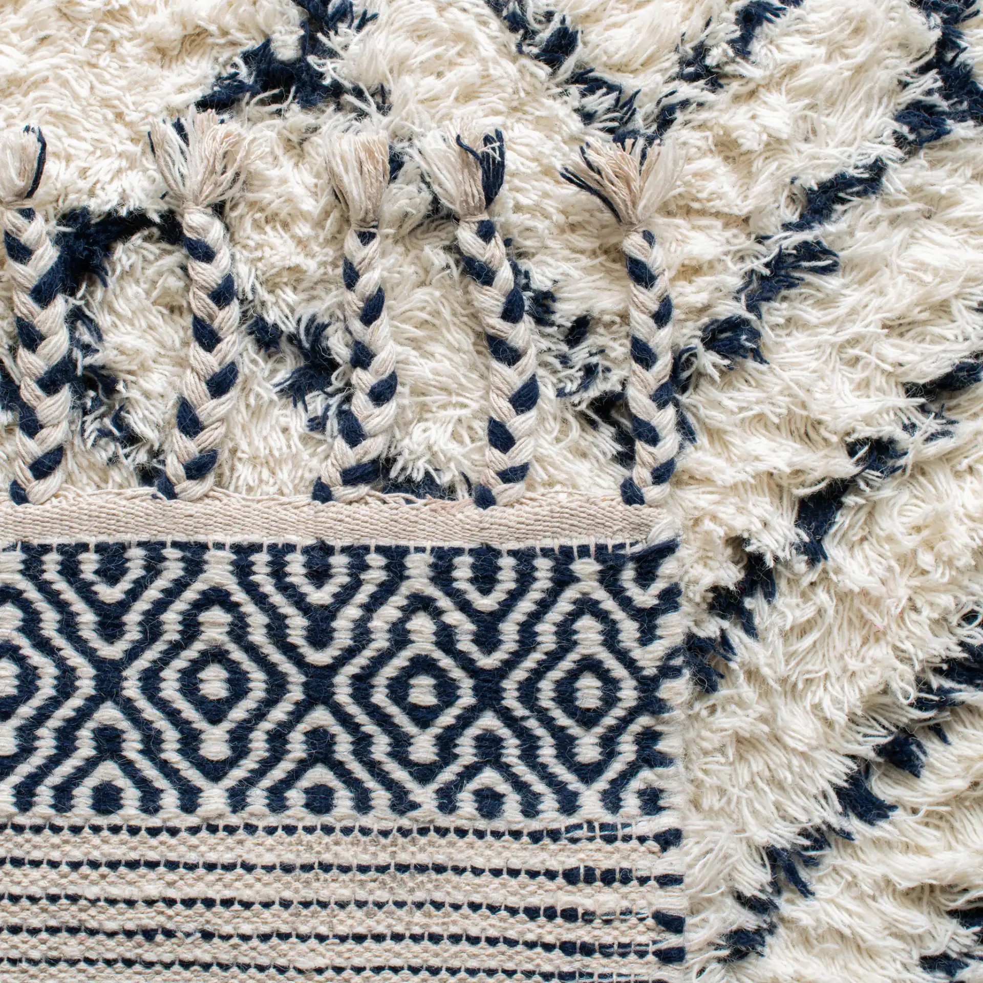 Casablanca Diamond Hand-Woven Shag Wool Rug in Ivory / Navy in a styled room