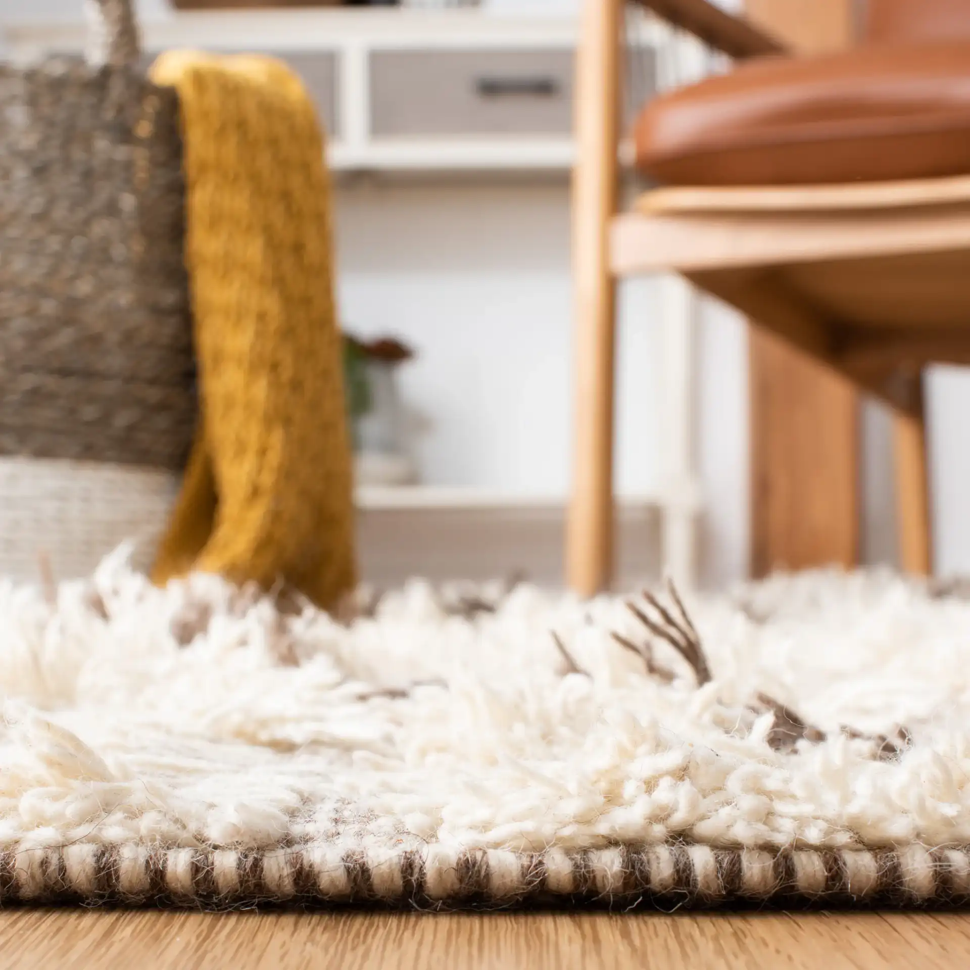 Casablanca Diamond Trellis Hand-Woven Shag Rug in Ivory / Taupe in a styled room