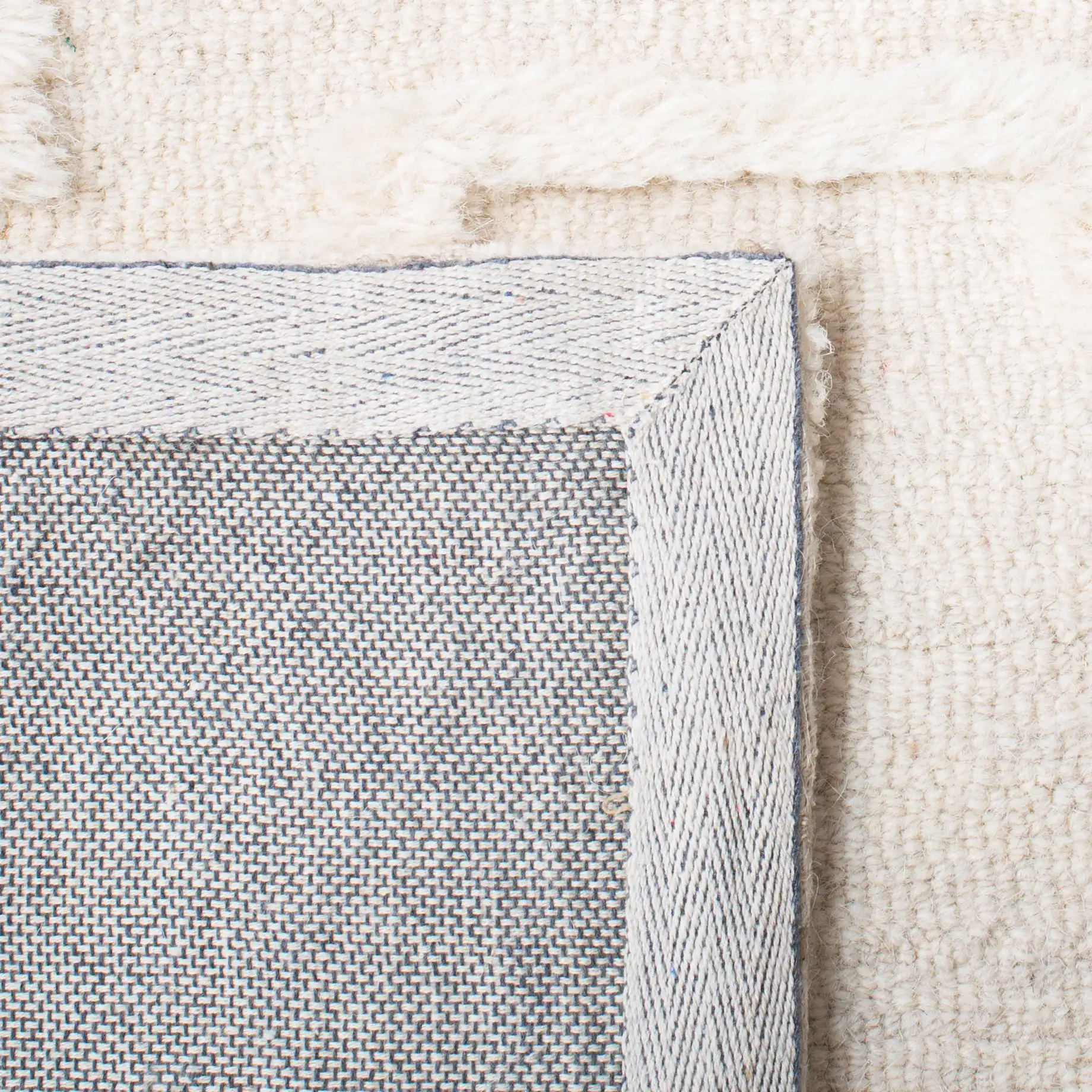 Casablanca Trellis Hand-Tufted Wool Rug in Ivory in a styled room