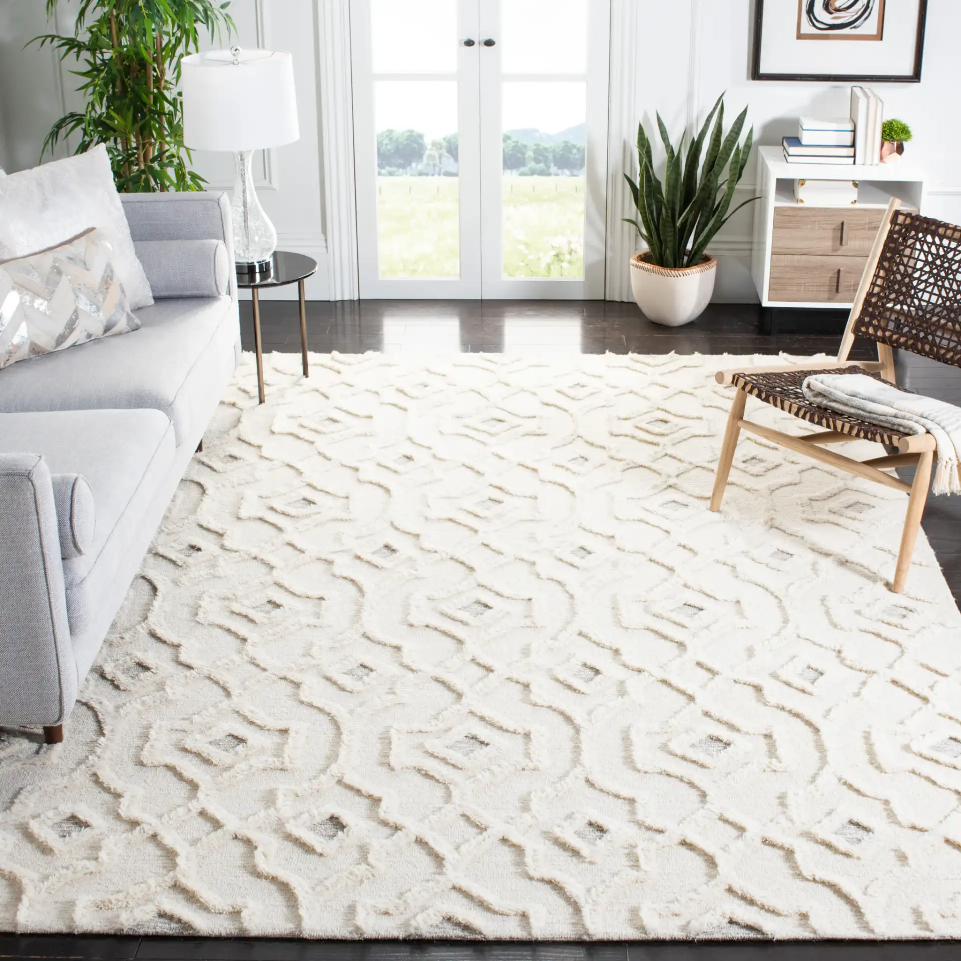 Casablanca Carved Trellis Hand-Tufted Wool Rug in Ivory in a styled room