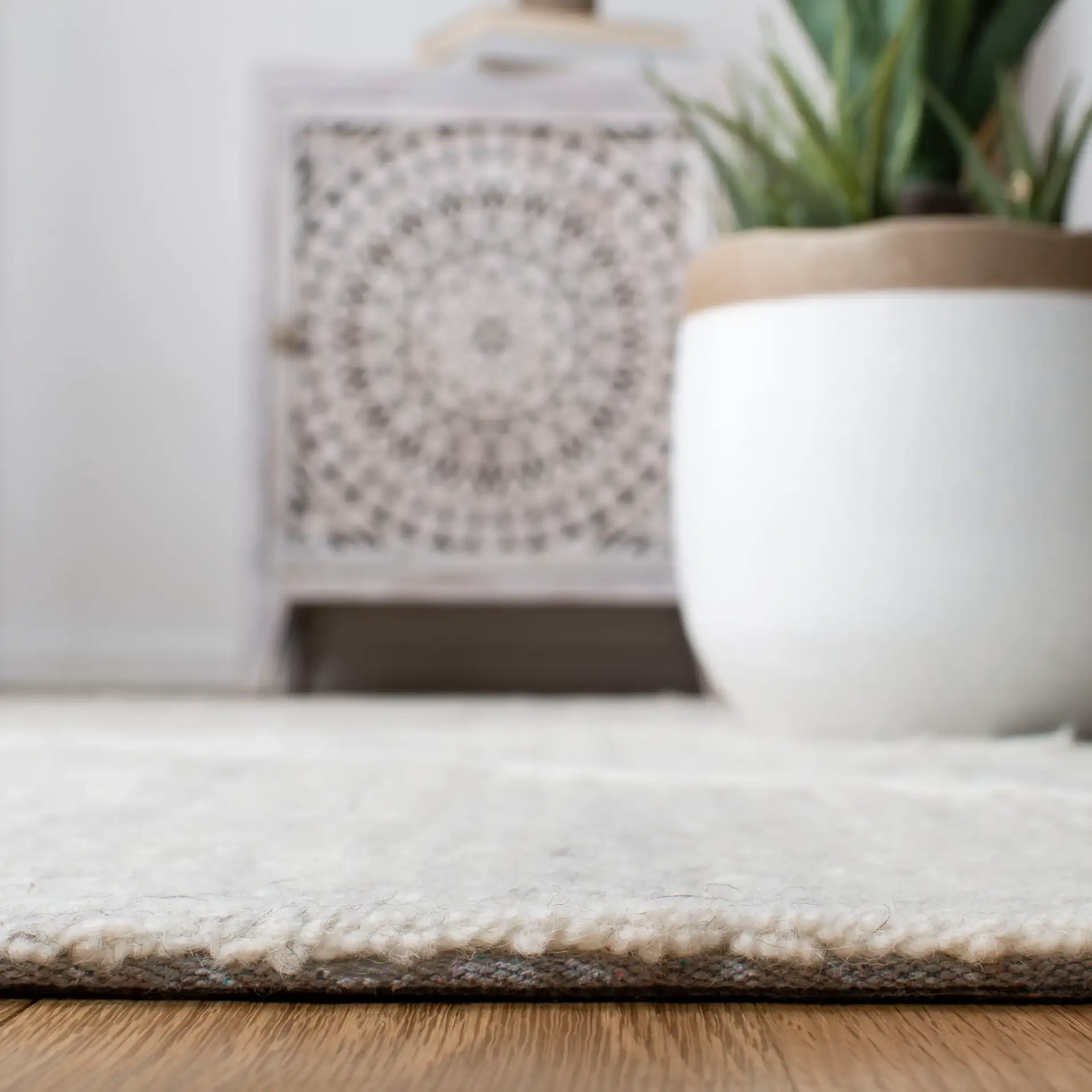 Casablanca Nested Diamond Hand-Tufted Wool Rug in Beige / Ivory in a styled room