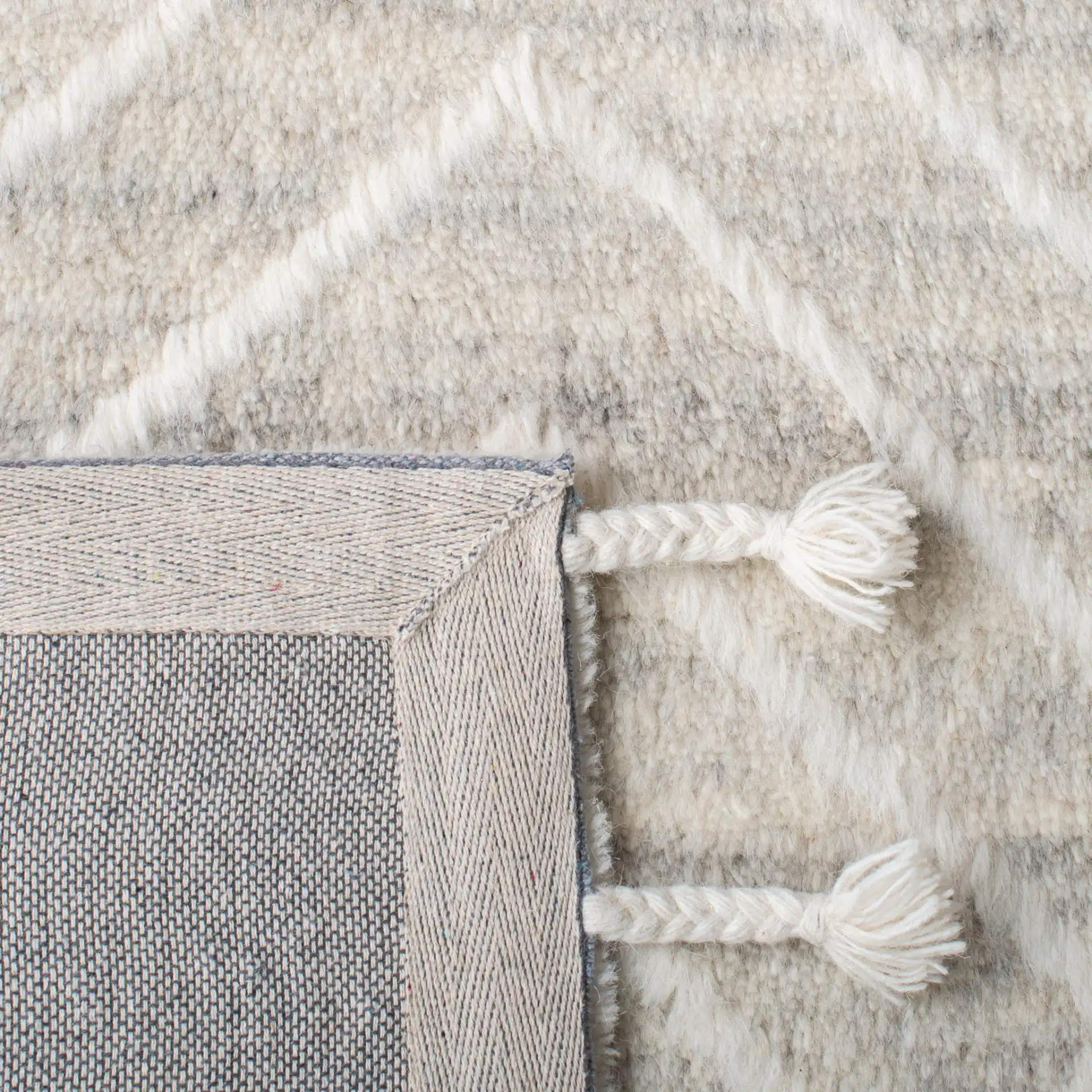 Casablanca Nested Diamond Hand-Tufted Wool Rug in Beige / Ivory in a styled room