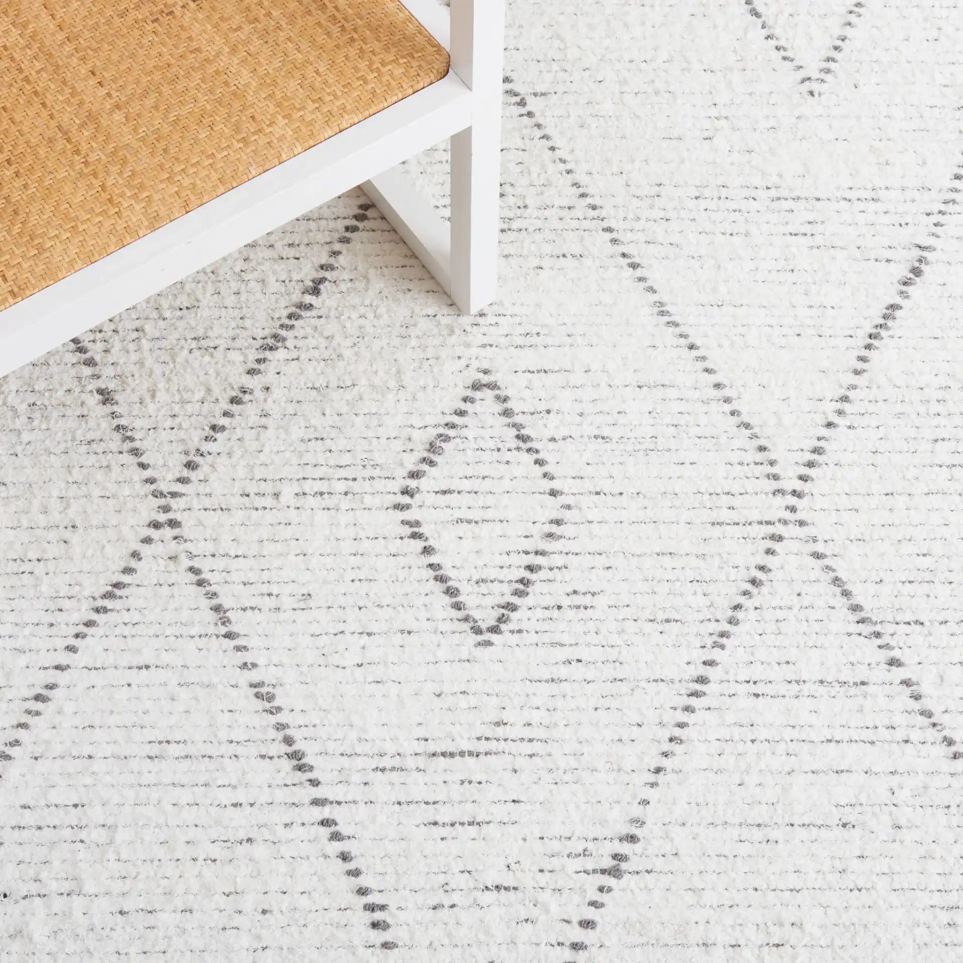 Casablanca Diamond Lattice Hand-Woven Cotton Rug in Ivory / Gray in a styled room