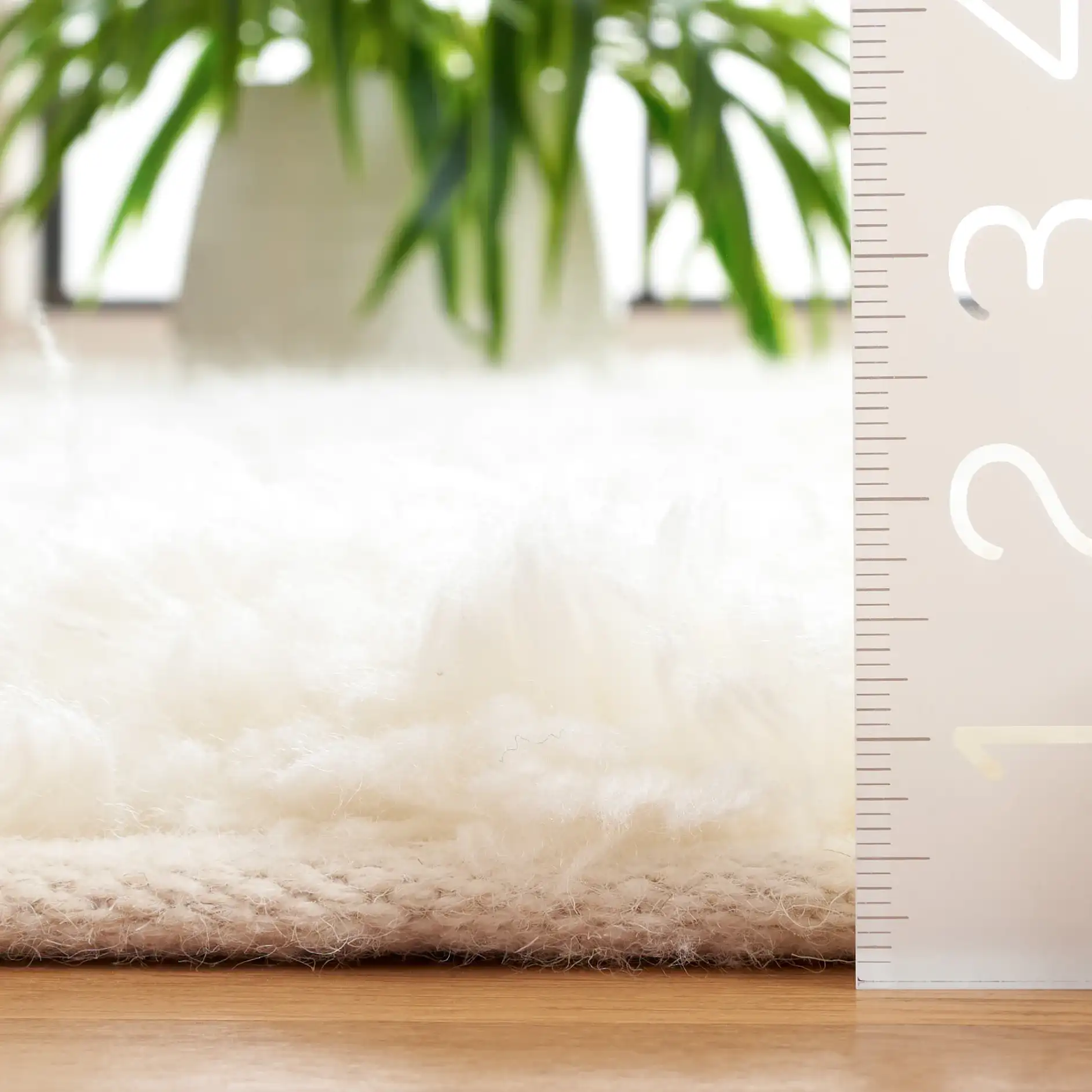 Casablanca Nested Diamond Shag Wool Rug in Ivory in a styled room