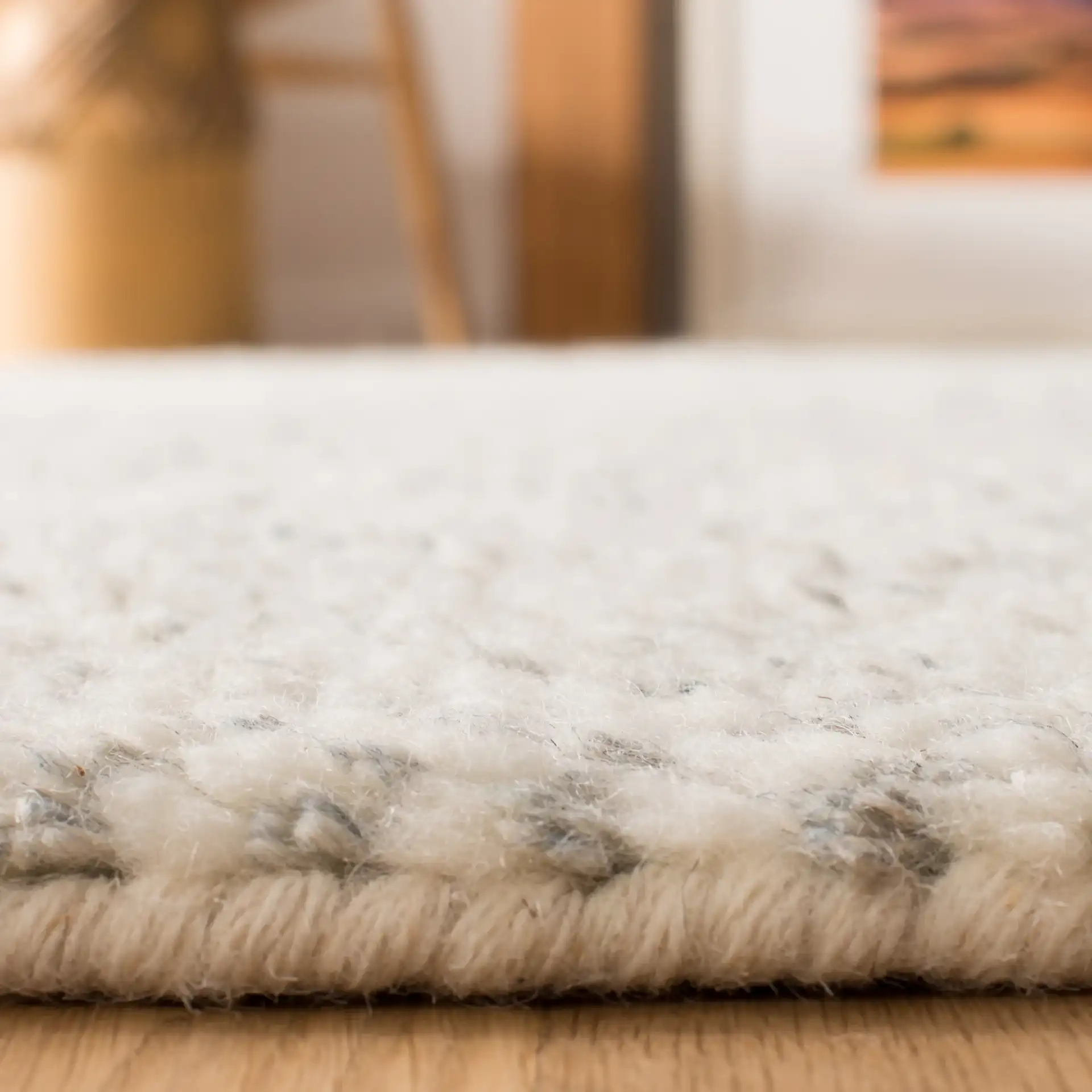 Casablanca Textured Solid Hand-Knotted Wool Rug in Gray in a styled room