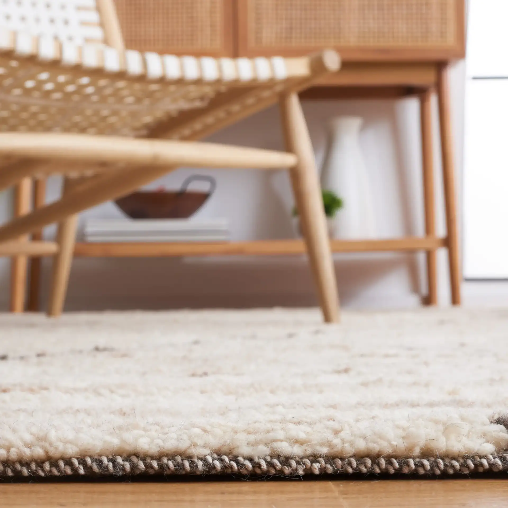 Casablanca Diamond Trellis Hand-Woven Wool Rug in Beige in a styled room