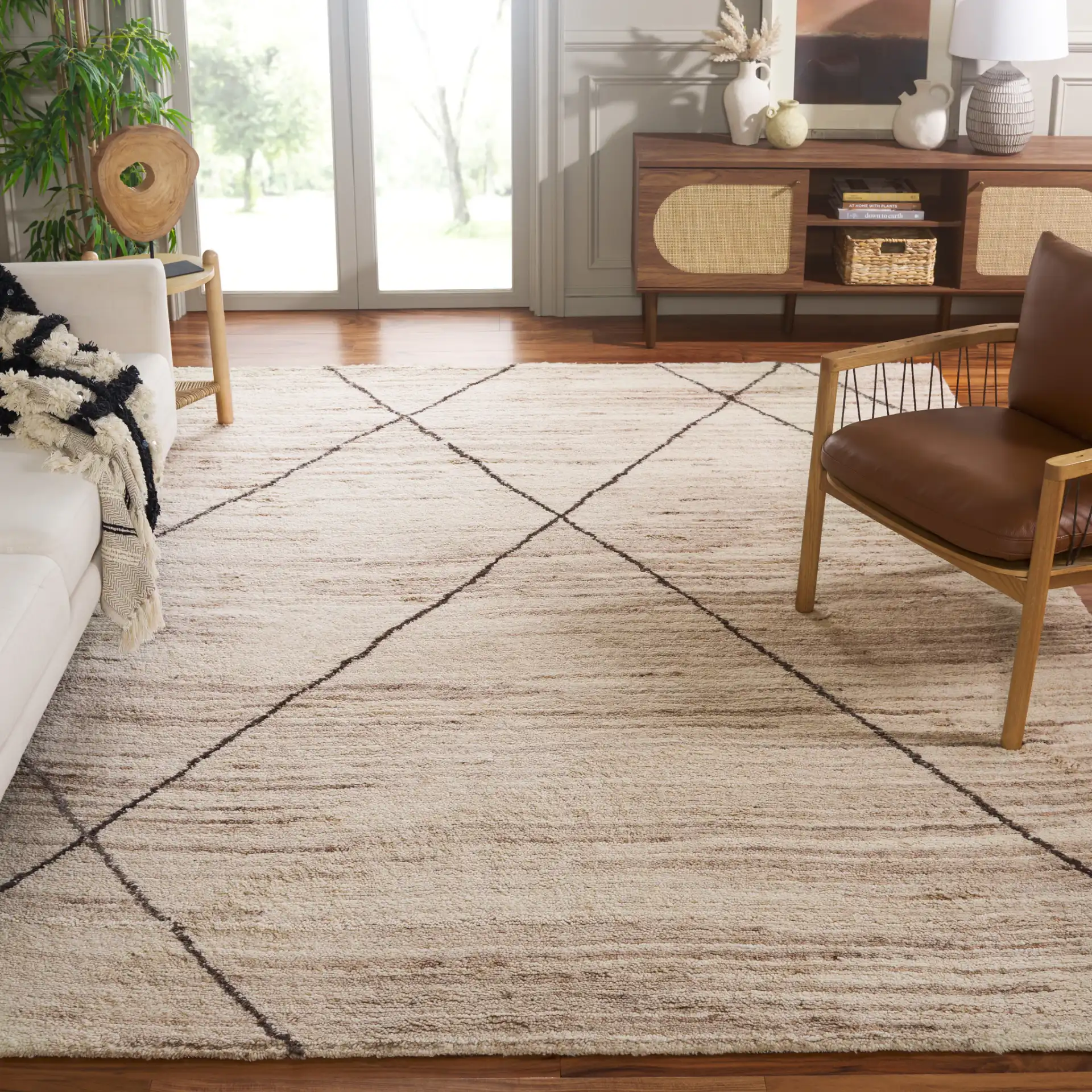 Casablanca Diamond Trellis Hand-Woven Wool Rug in Beige in a styled room