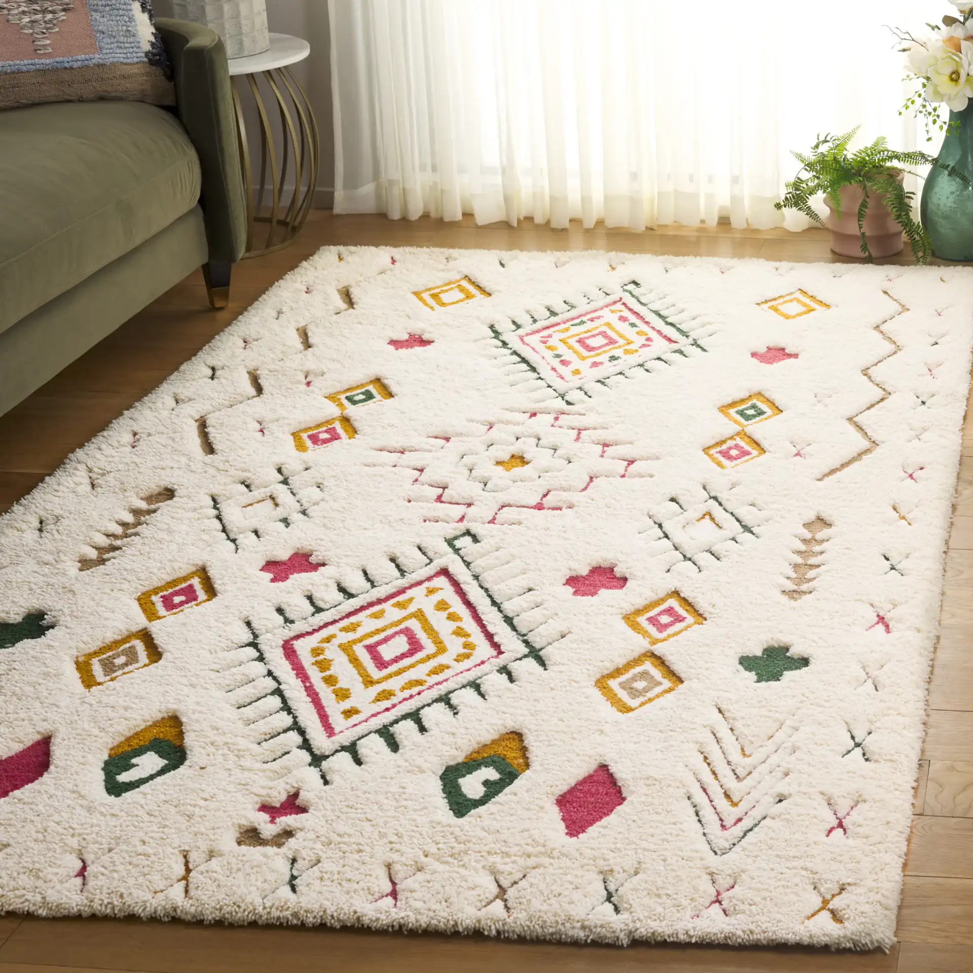 Casablanca Tribal Motif Hand-Tufted Shag Wool Rug in Ivory / Pink in a styled room